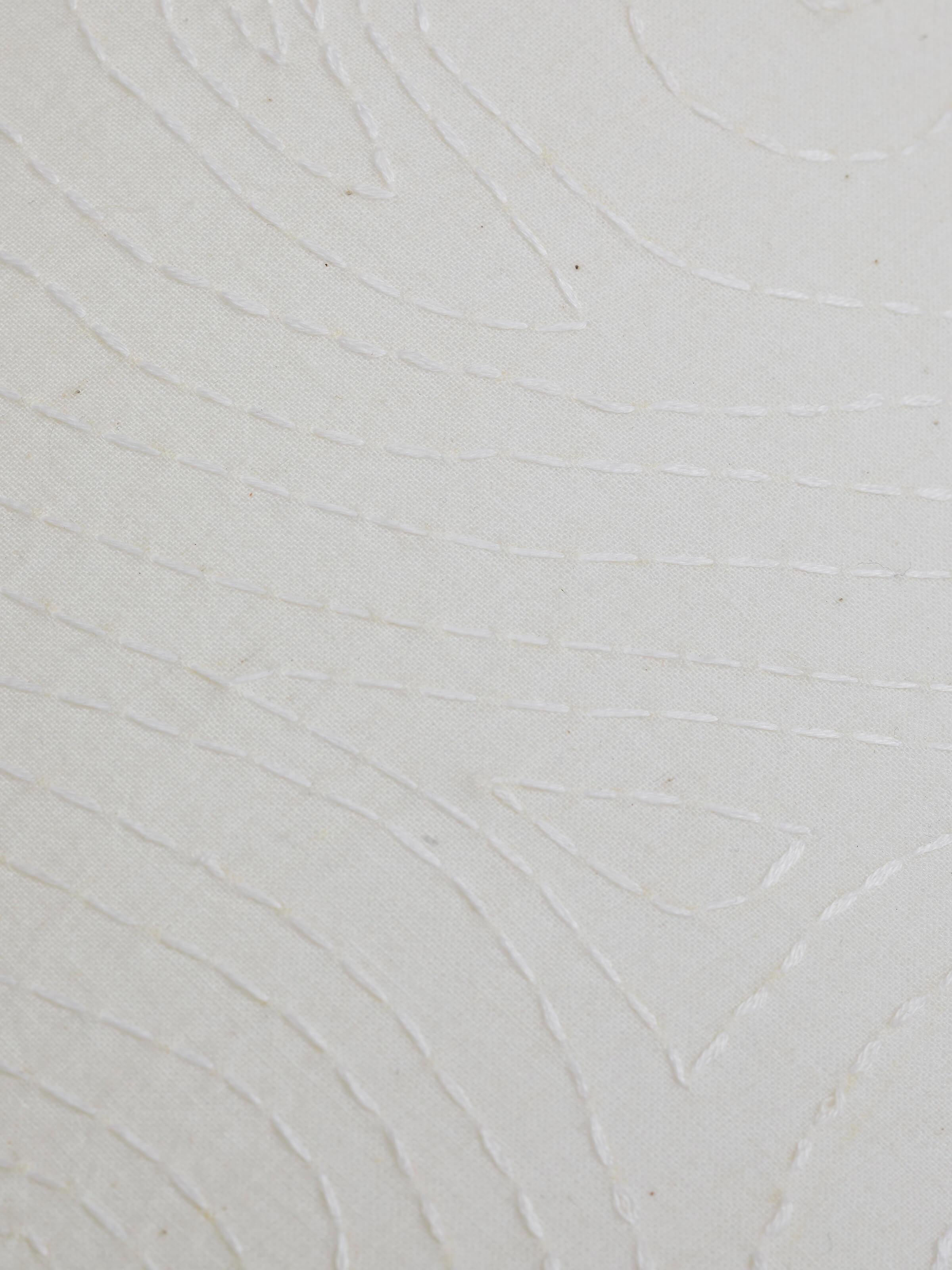 Angled view of Sujani Embroidered Simple Cotton Lampshade, showing the overall shape and design elements