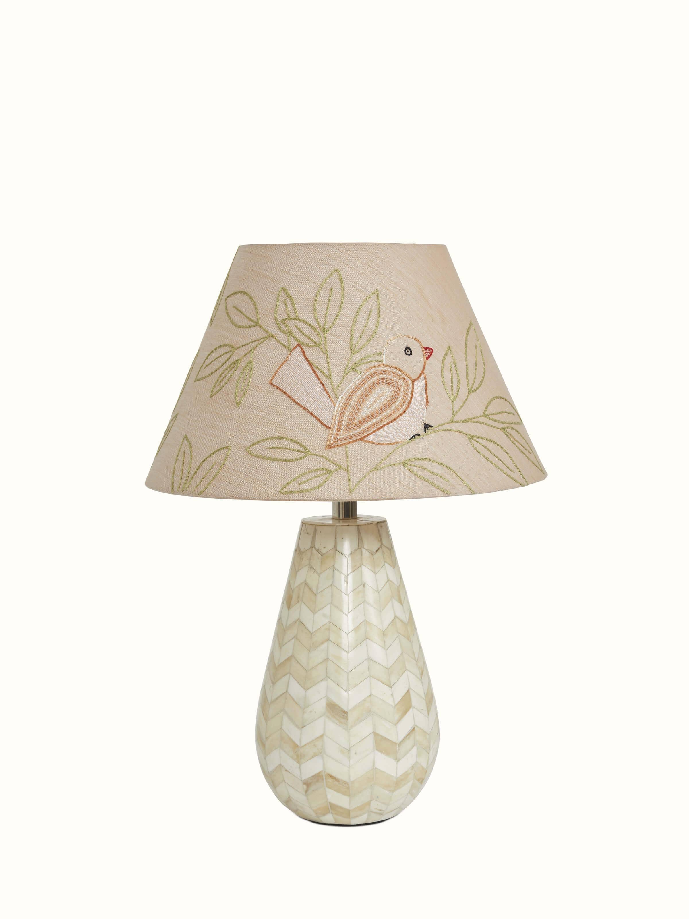 Front view of Sujani embroidered cotton lampshade in large beige color featuring intricate embroidery and elegant design