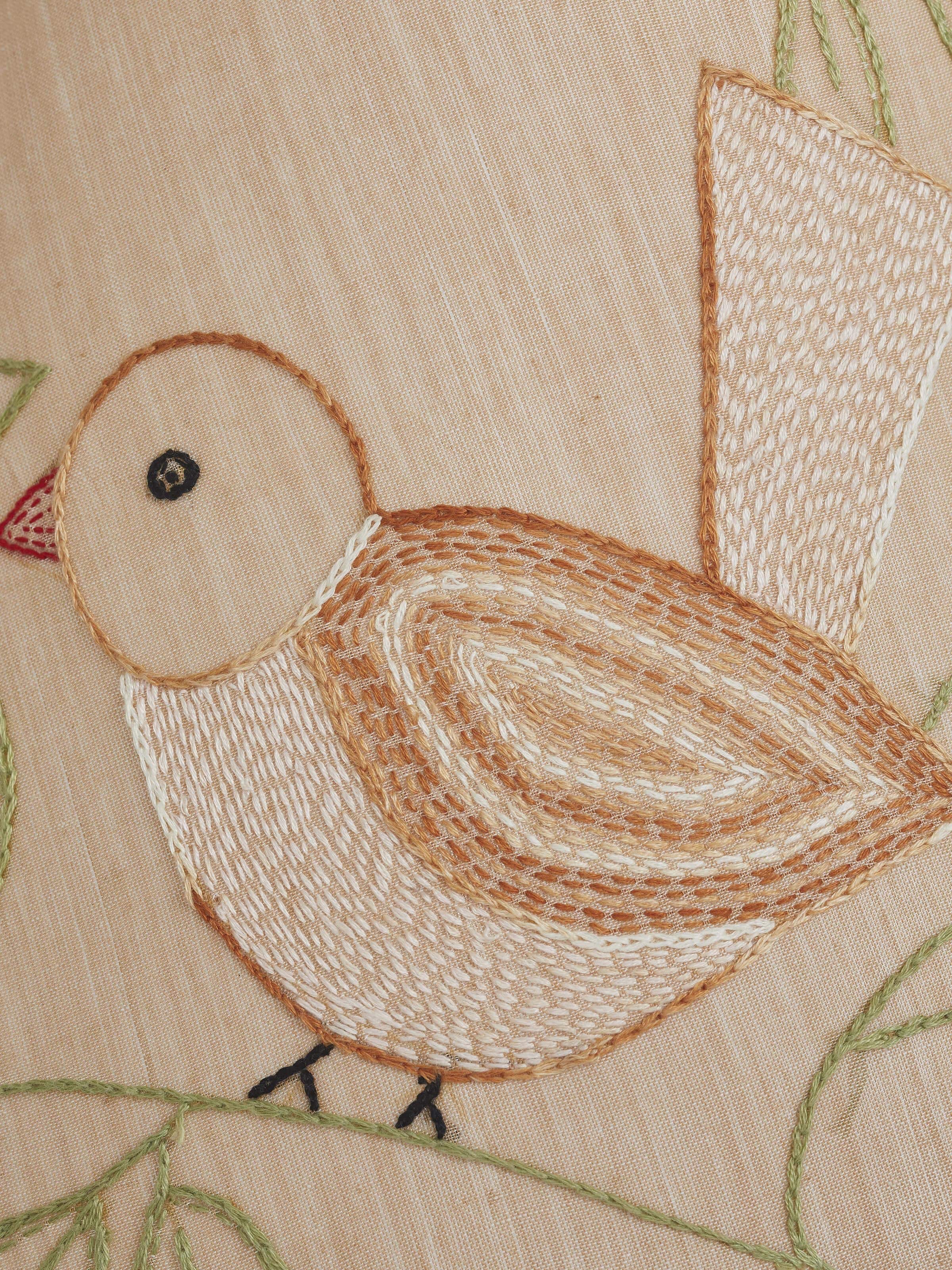 Angled view of Sujani Embroidered Cotton Lampshade in Medium Beige Color, providing a full view of the design