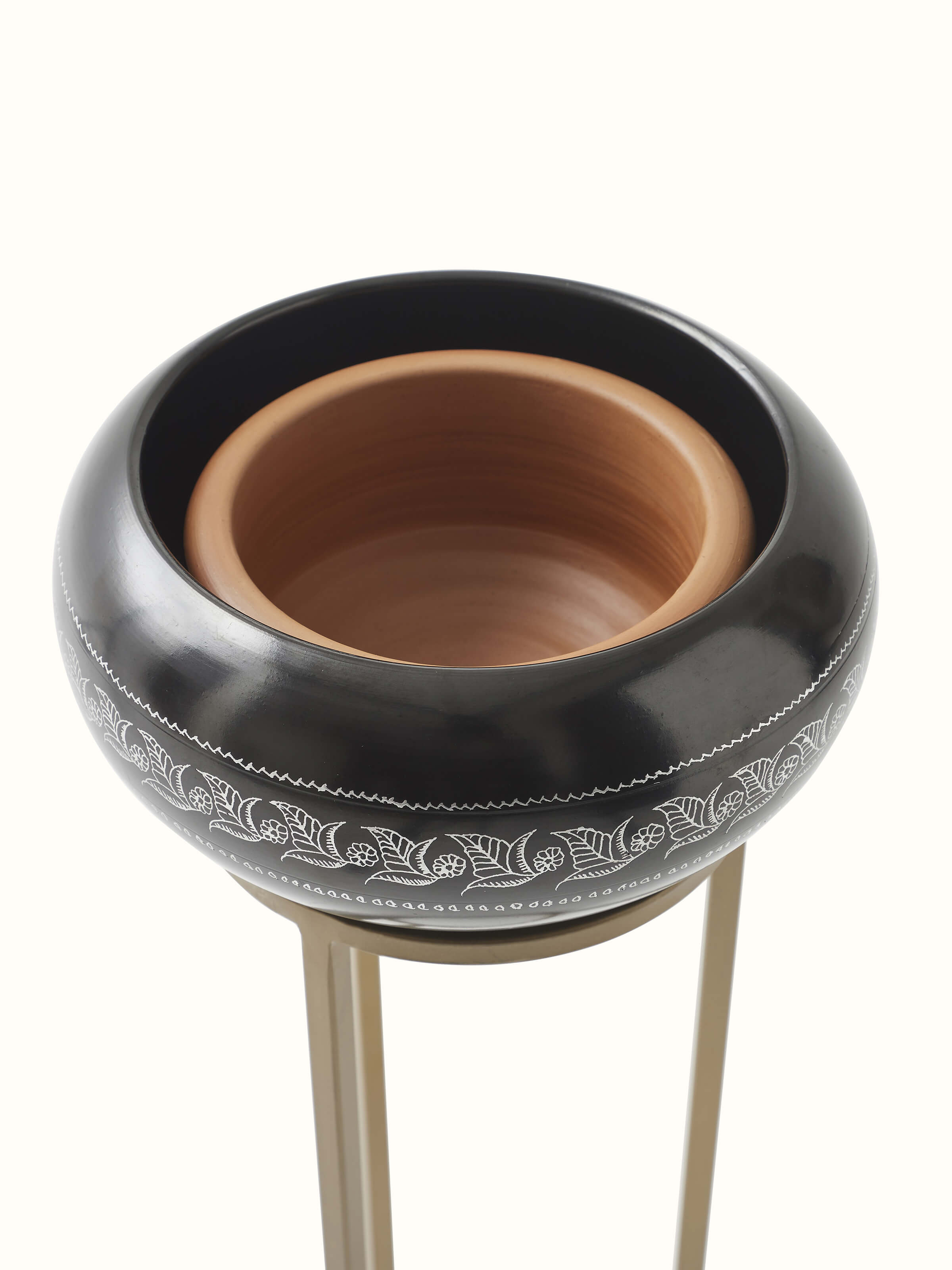 Close-up of Traditional Black Pottery Ceramic Planter highlighting its texture and craftsmanship.