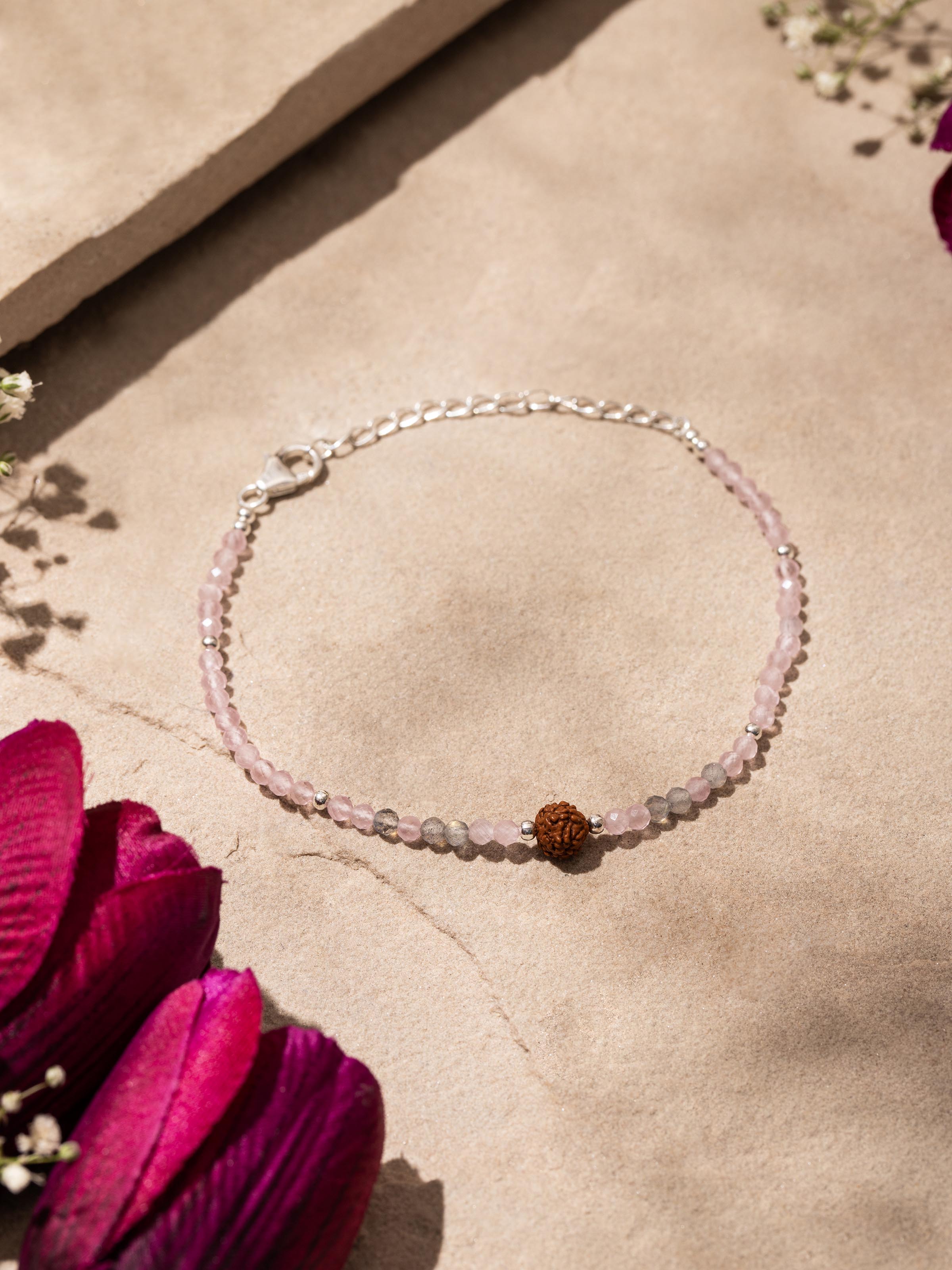 Side view of Rose Quartz, Labradorite & Rudraksha Sterling Silver Bracelet highlighting gemstone arrangement