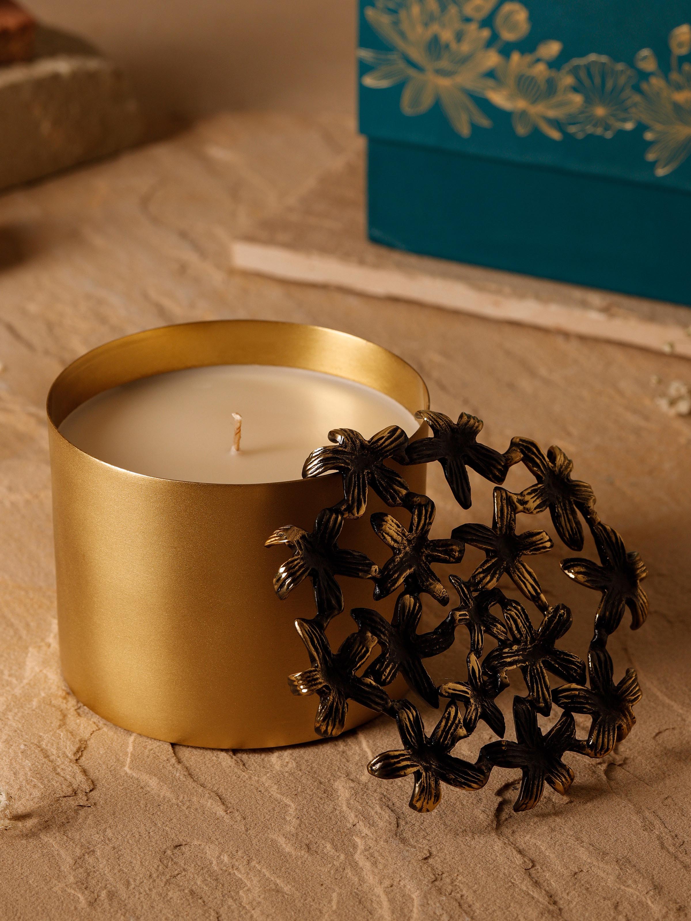 Close-up of Jasmine Brass Candle showcasing the texture of the brass and candle flame