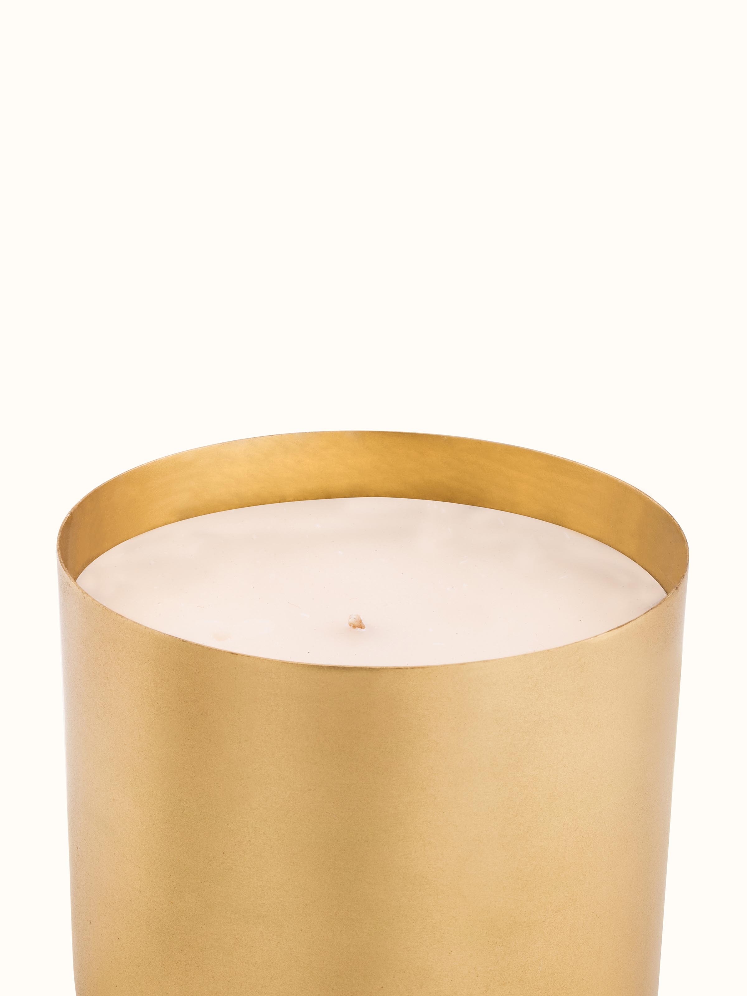 Jasmine Brass Candle displayed in a cozy setting, enhancing its ambiance and decorative appeal
