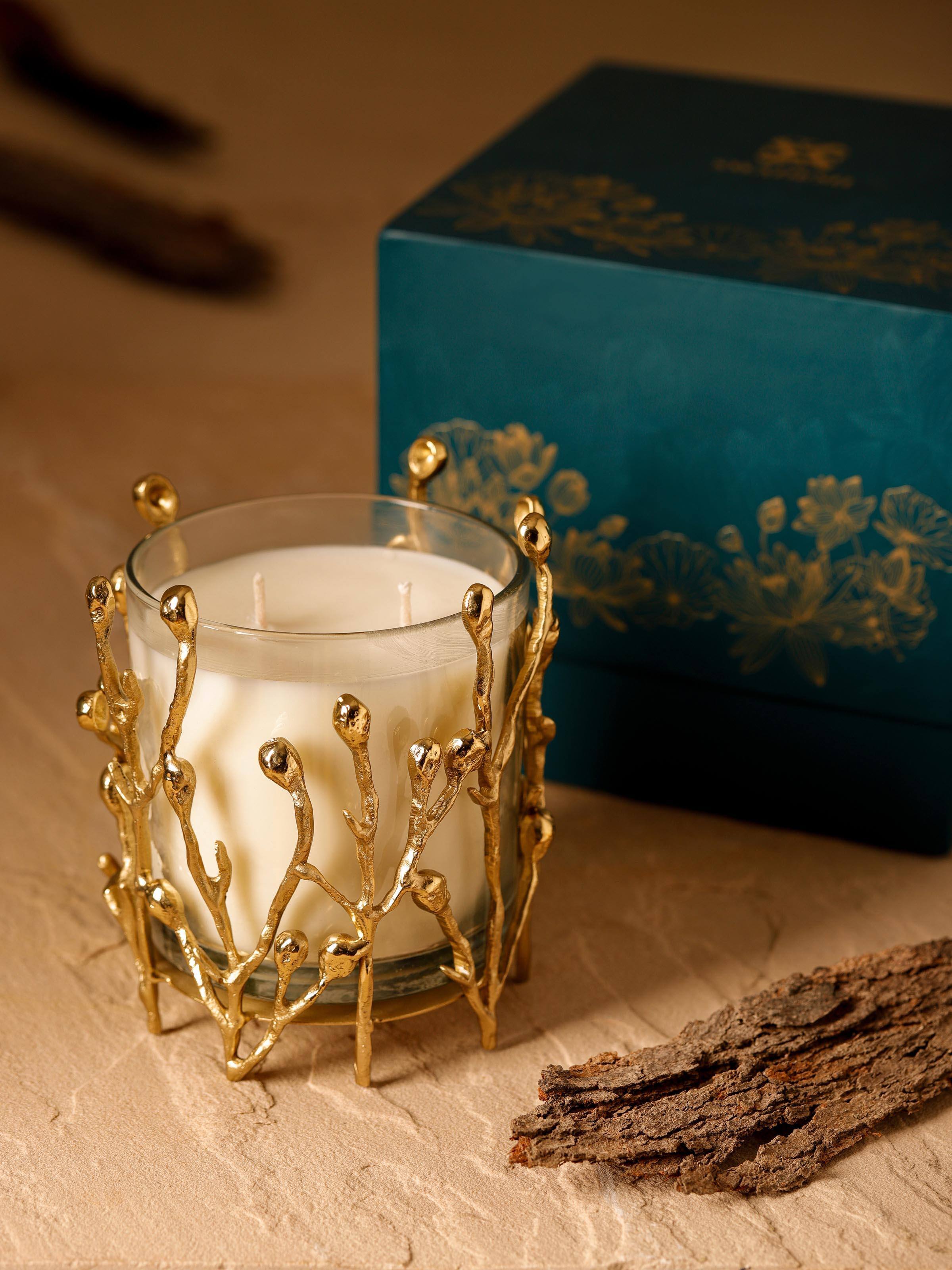 Front view of Brass Candle (Small) emphasizing its sleek brass texture.