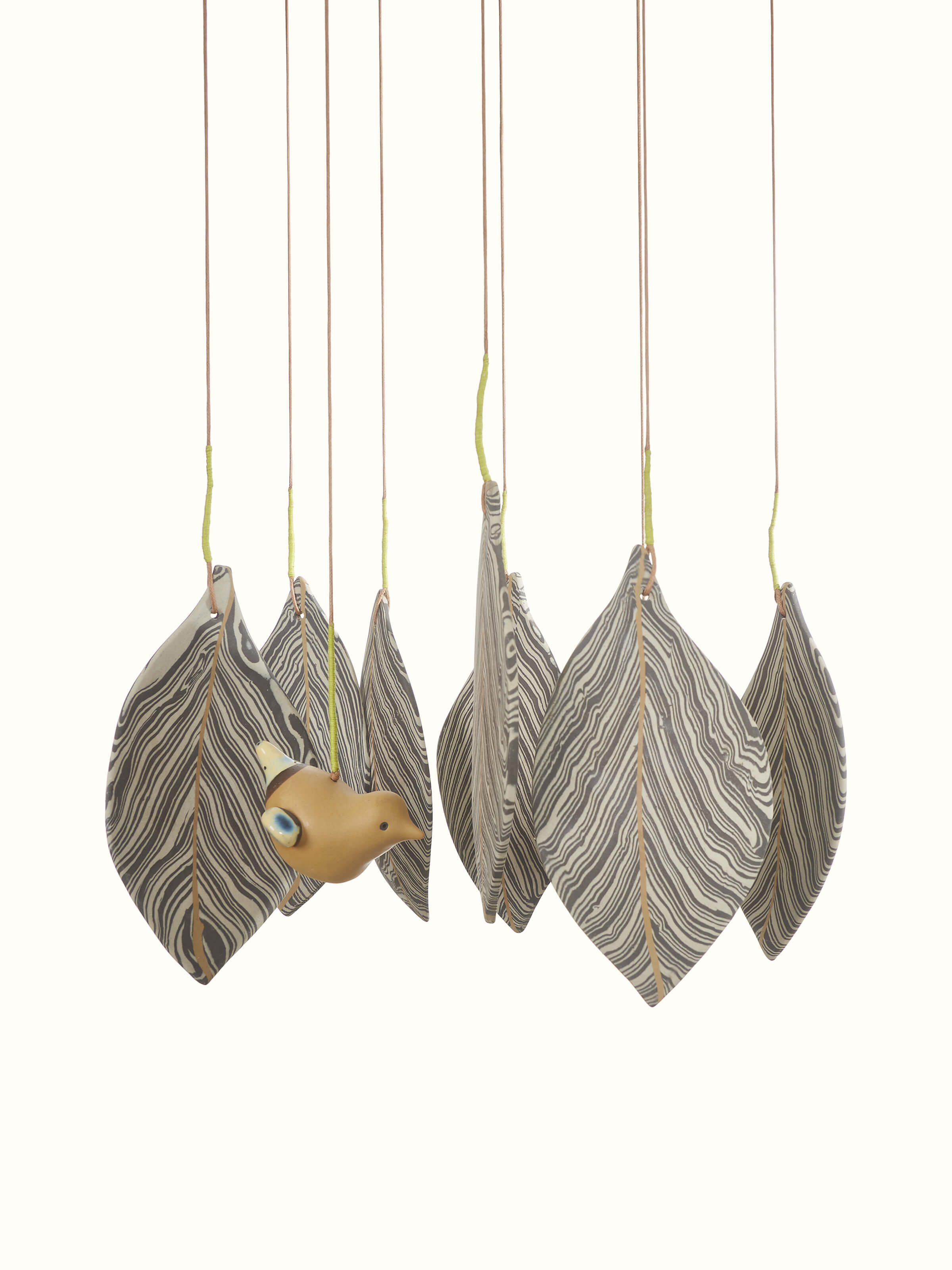 Close-up of Harmonious ceramicware clay wind chime showcasing intricate details and textures