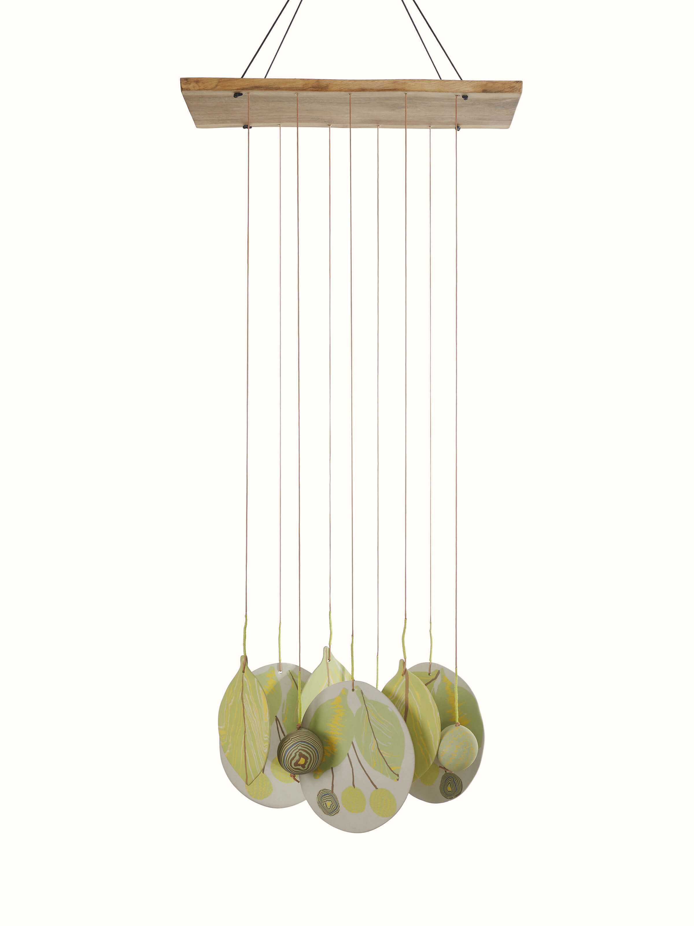 Side view of Melodious Ceramicware Clay Wind Chime, highlighting the detailed ceramicwork and hanging design.