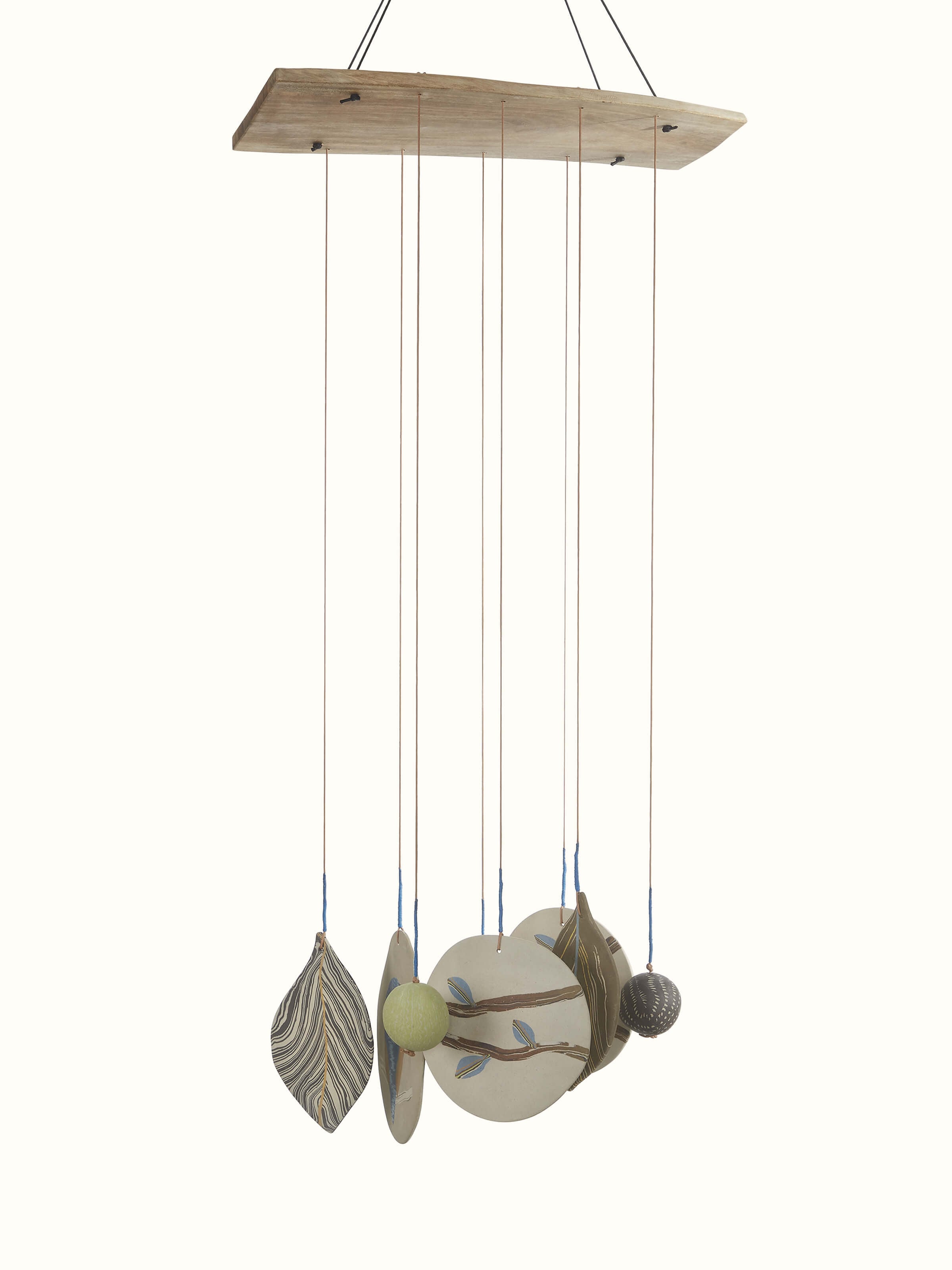 Front view of Whispering ceramicware clay wind chime showcasing its delicate design