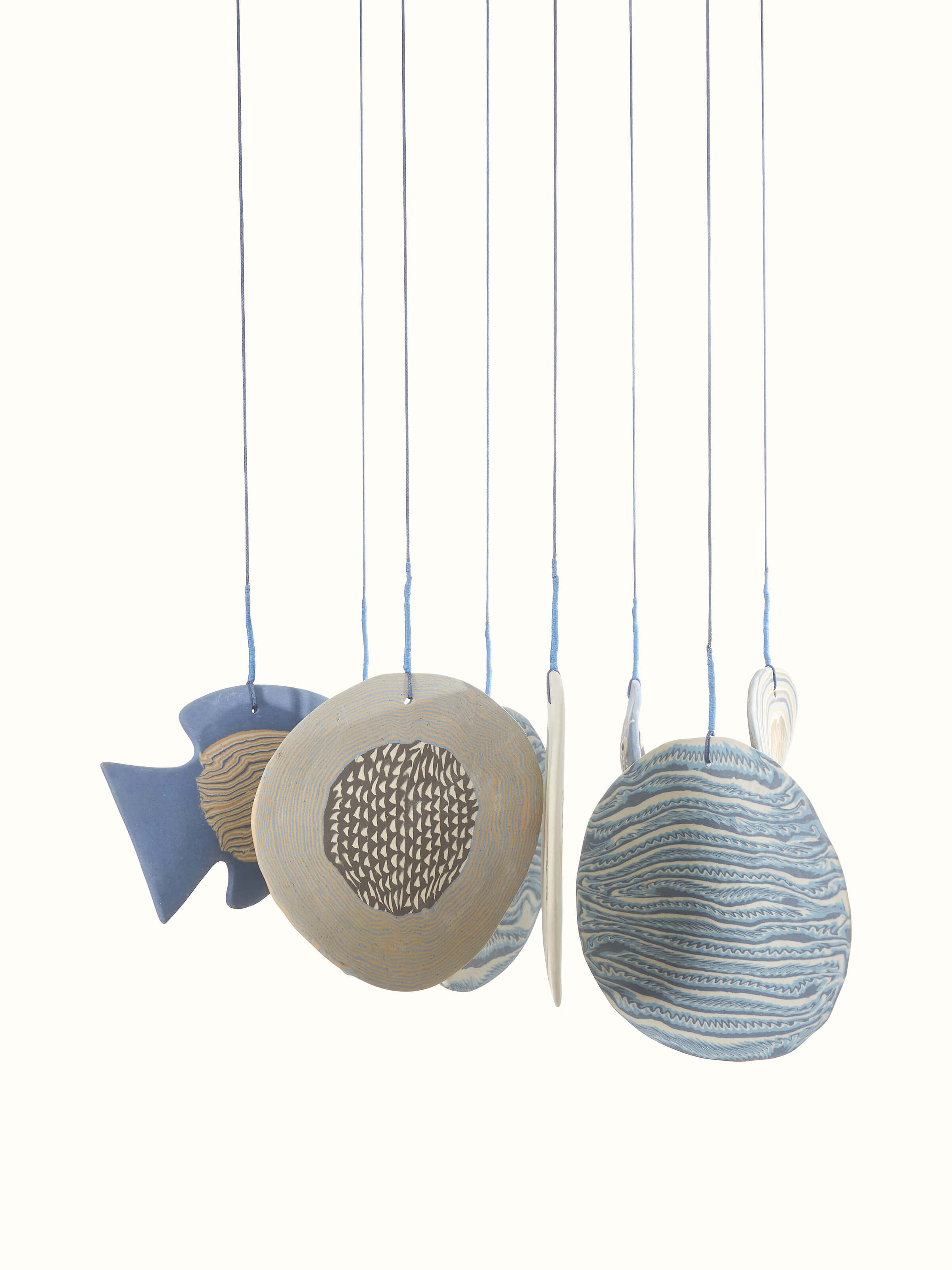 Detailed view of the symphonic ceramicware clay wind chime highlighting its delicate craftsmanship.