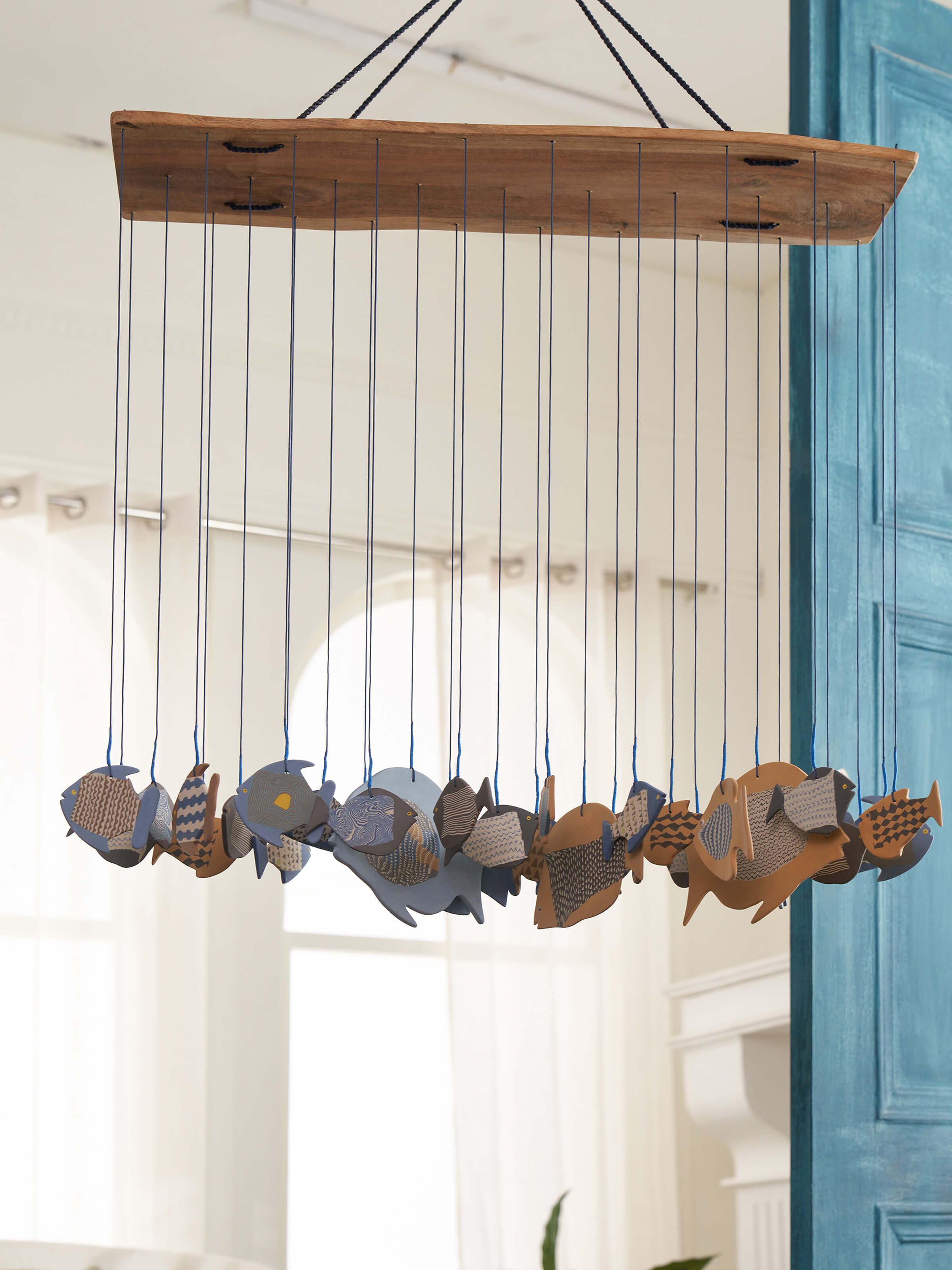 Side view of ceramicware clay wind chime showing its delicate features
