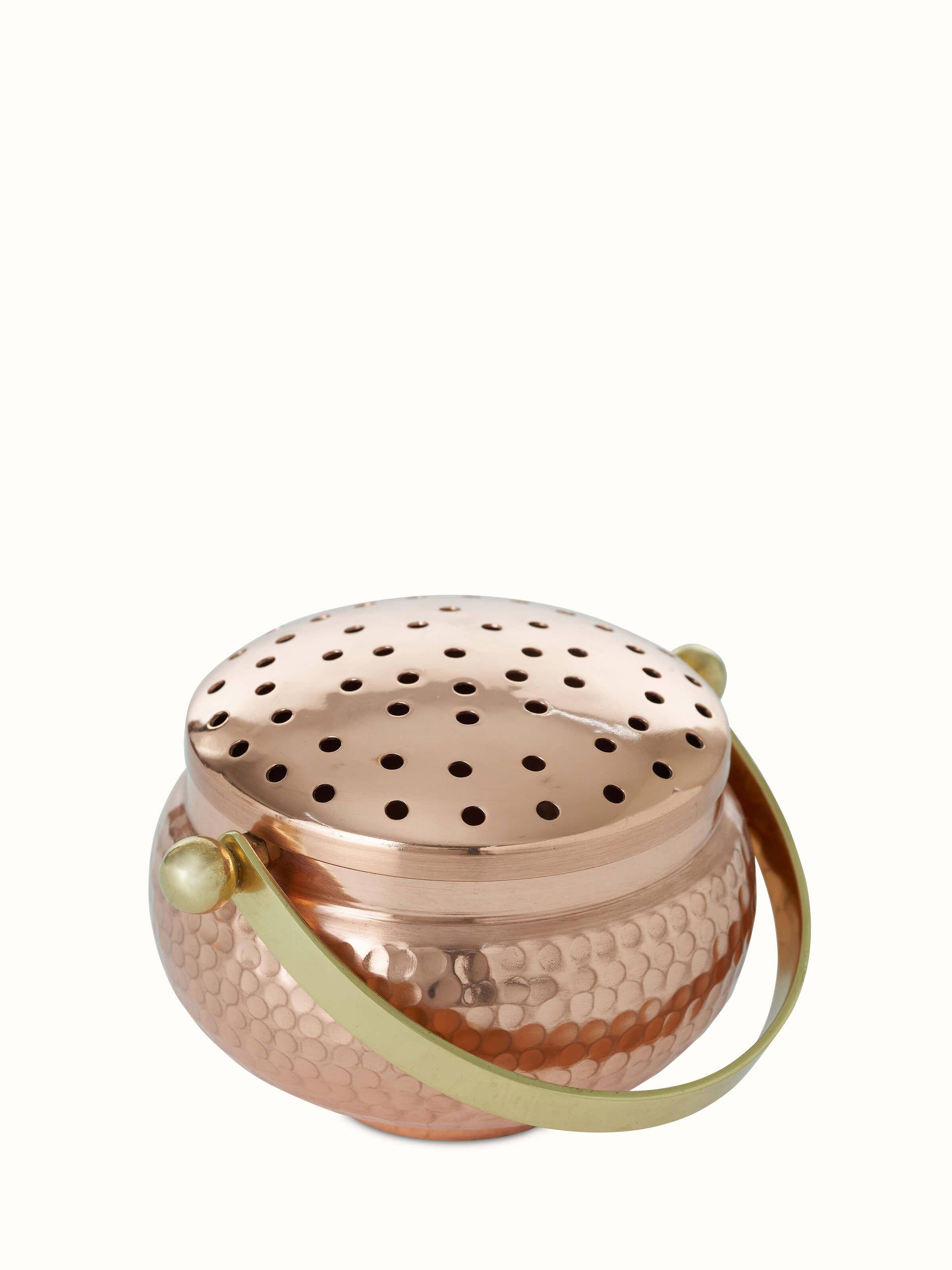 Front view of Polished copperware dhuna small