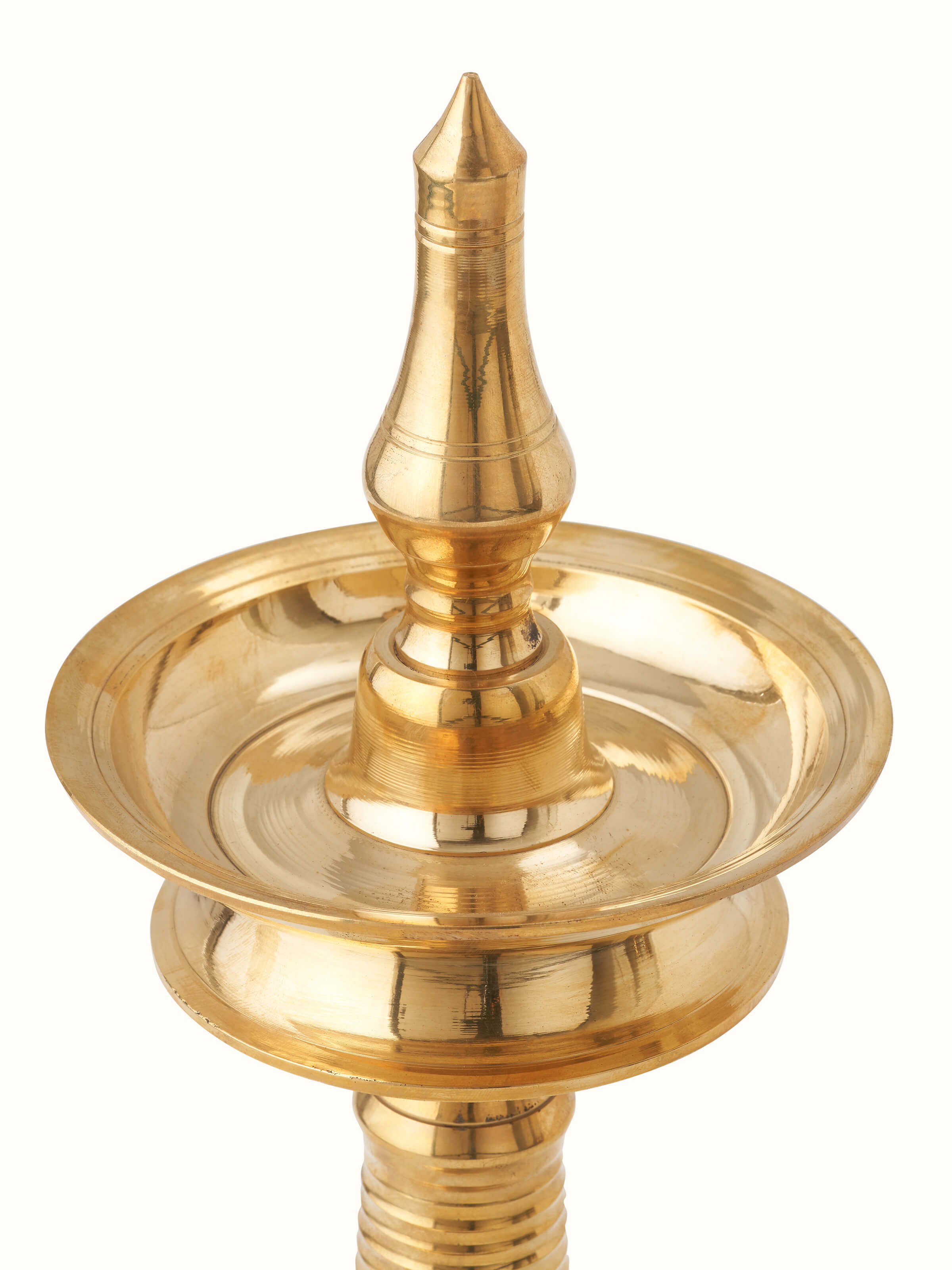 Artistic view of Brass Kuthu Vilakku Stand Diya, showcasing its ornamental design and traditional aesthetics