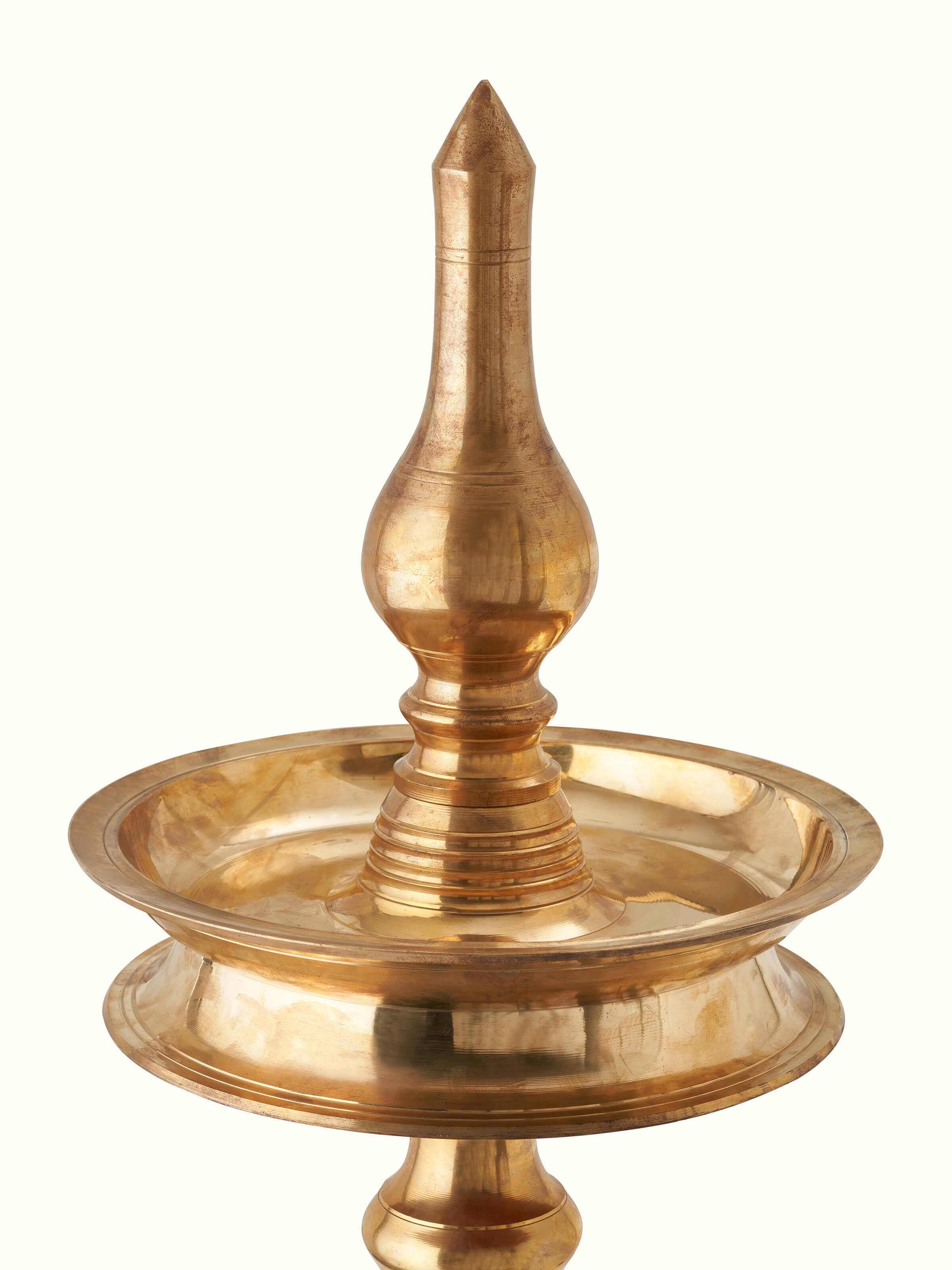 Side view of Brass-Plated Samai Vilakku Stand Diya focusing on the stand's design and construction.