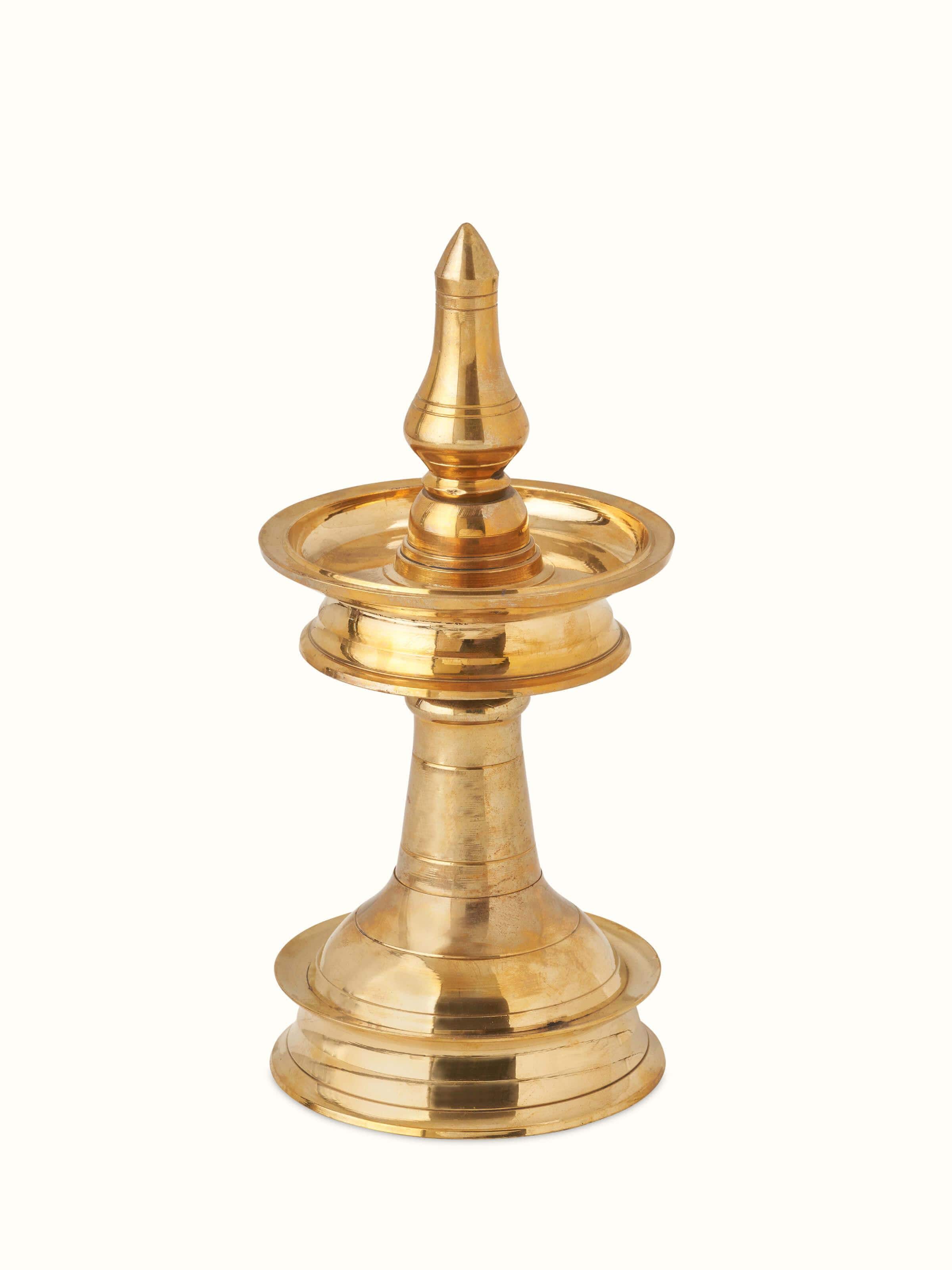 Front view of Brass-plated Samai Vilakku stand diya showcasing detailed craftsmanship and traditional design