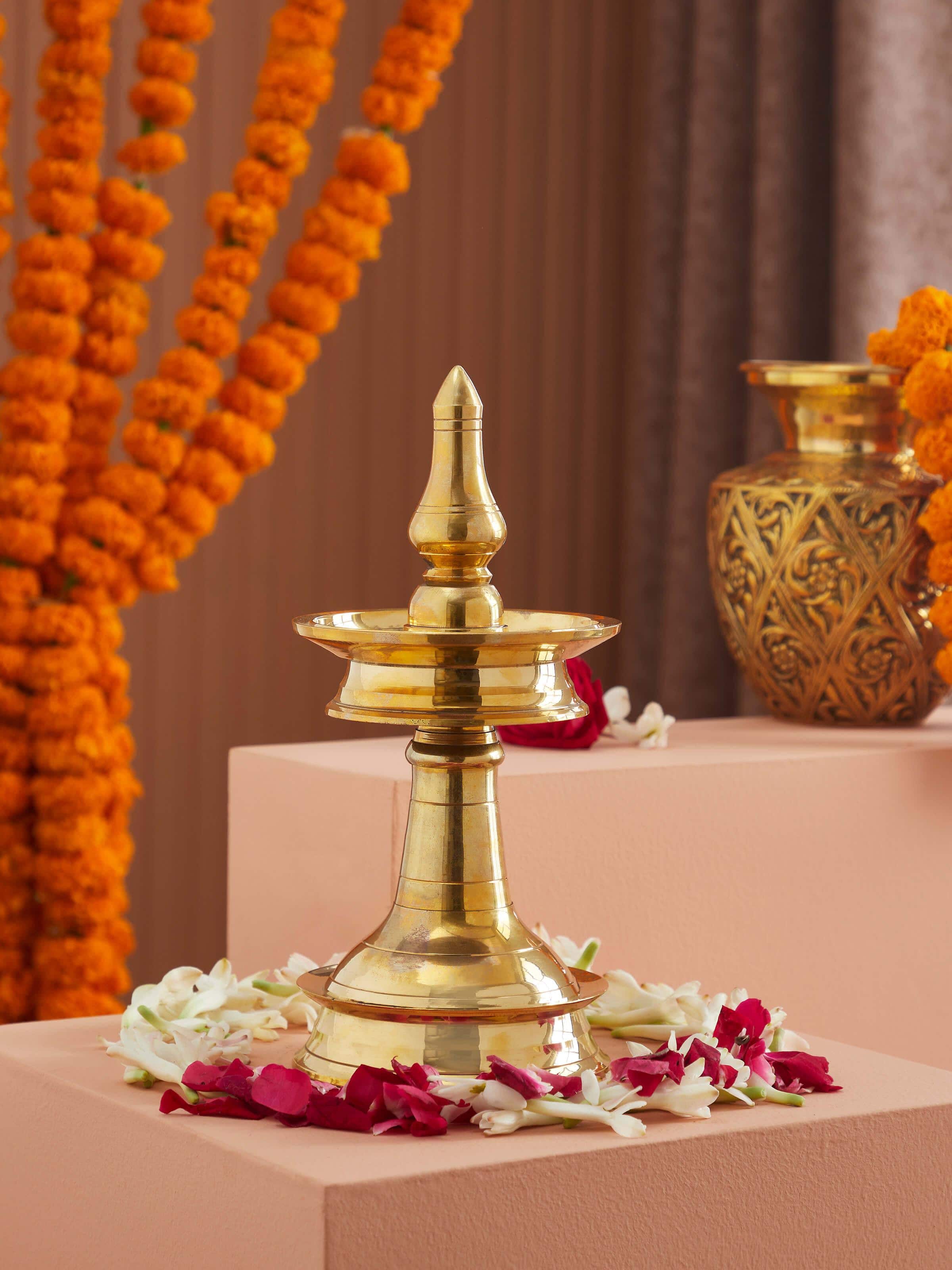 Side view of Brass-plated Samai Vilakku stand diya highlighting its elegant brass plating and intricate details