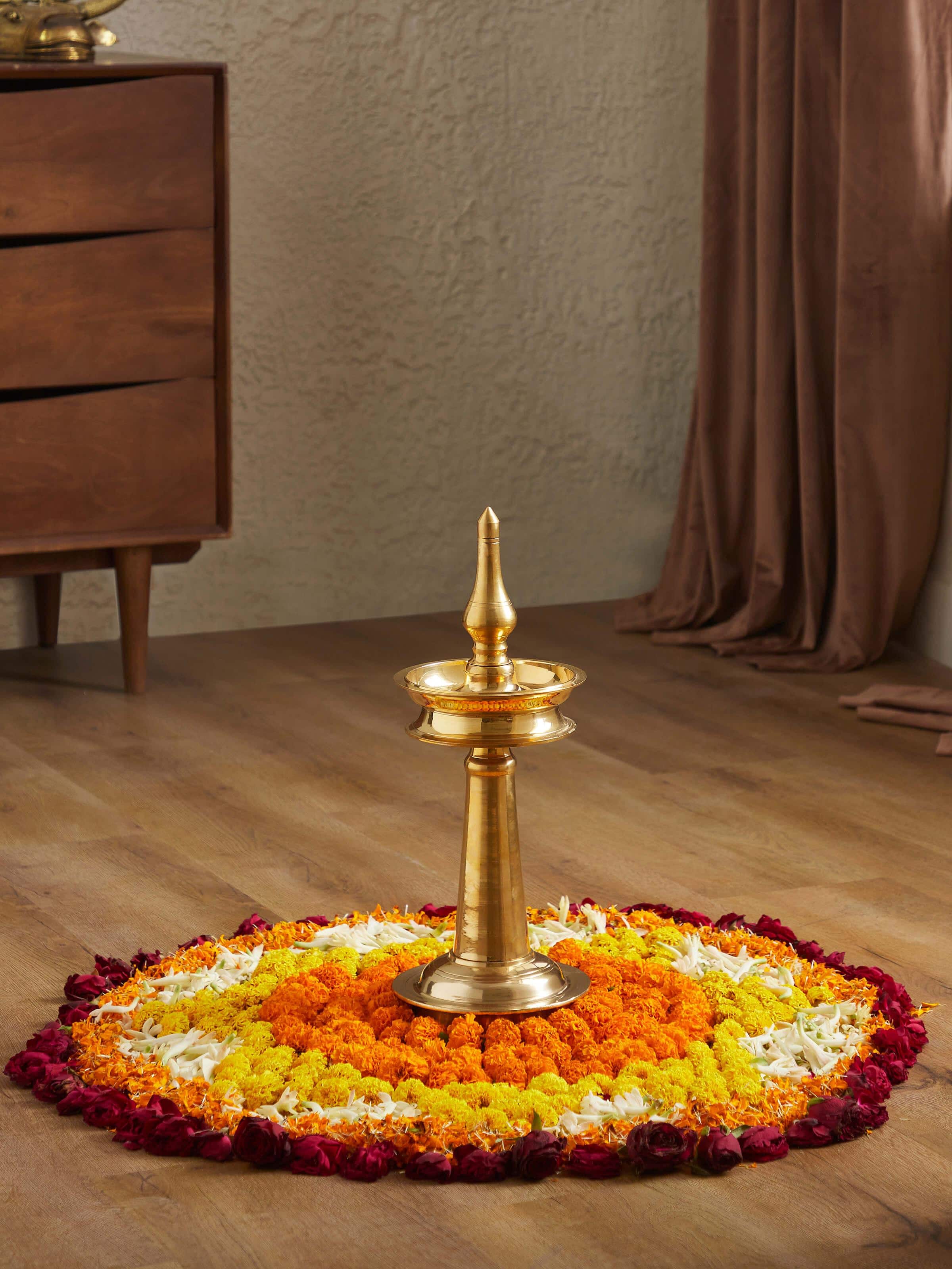 Side view of Polished Brass-Plated Samai Vilakku Stand Diya focusing on the detailing of the stand