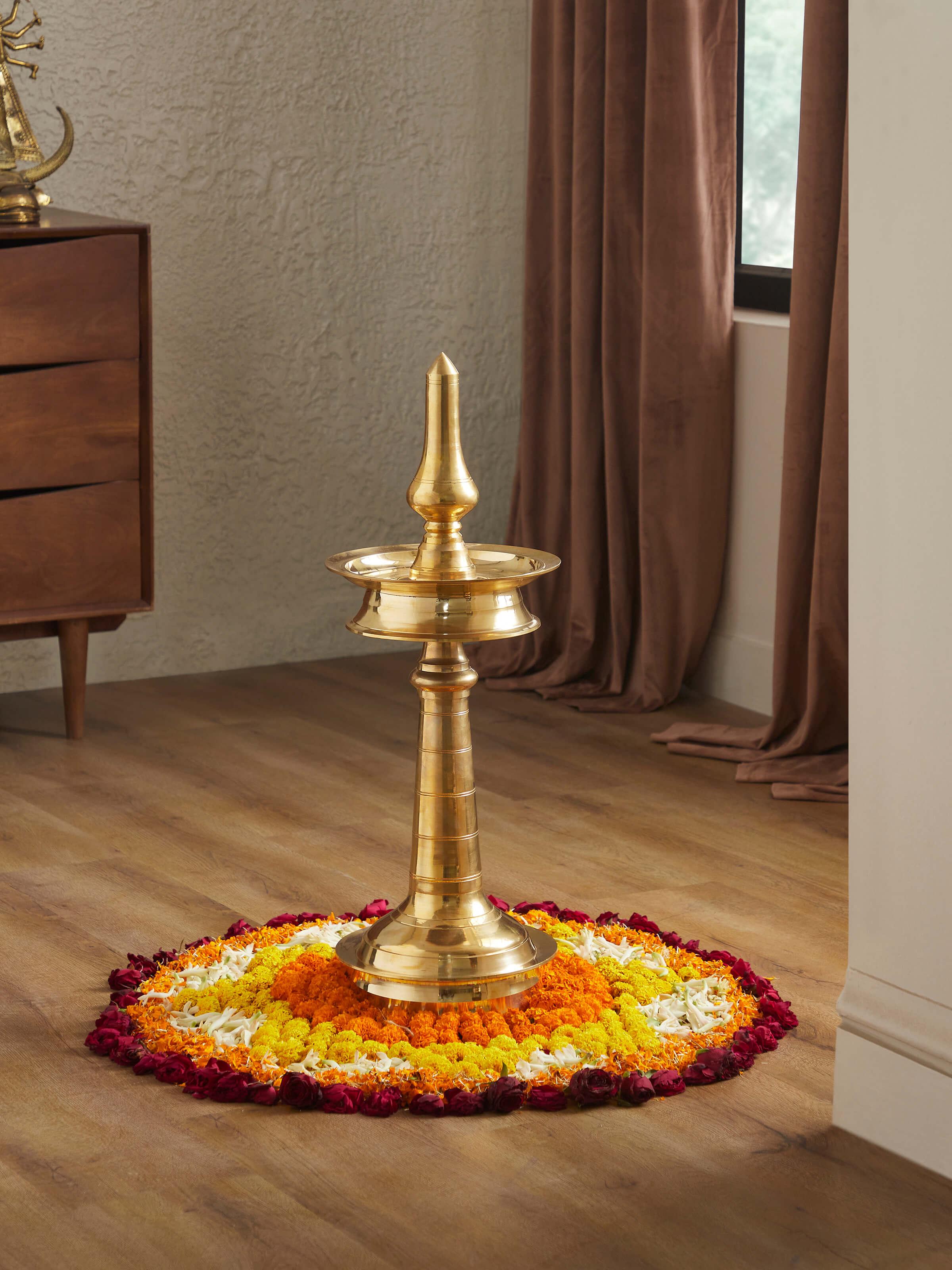 Side view of Brass-Plated Samai Vilakku Stand Diya emphasizing intricate details.