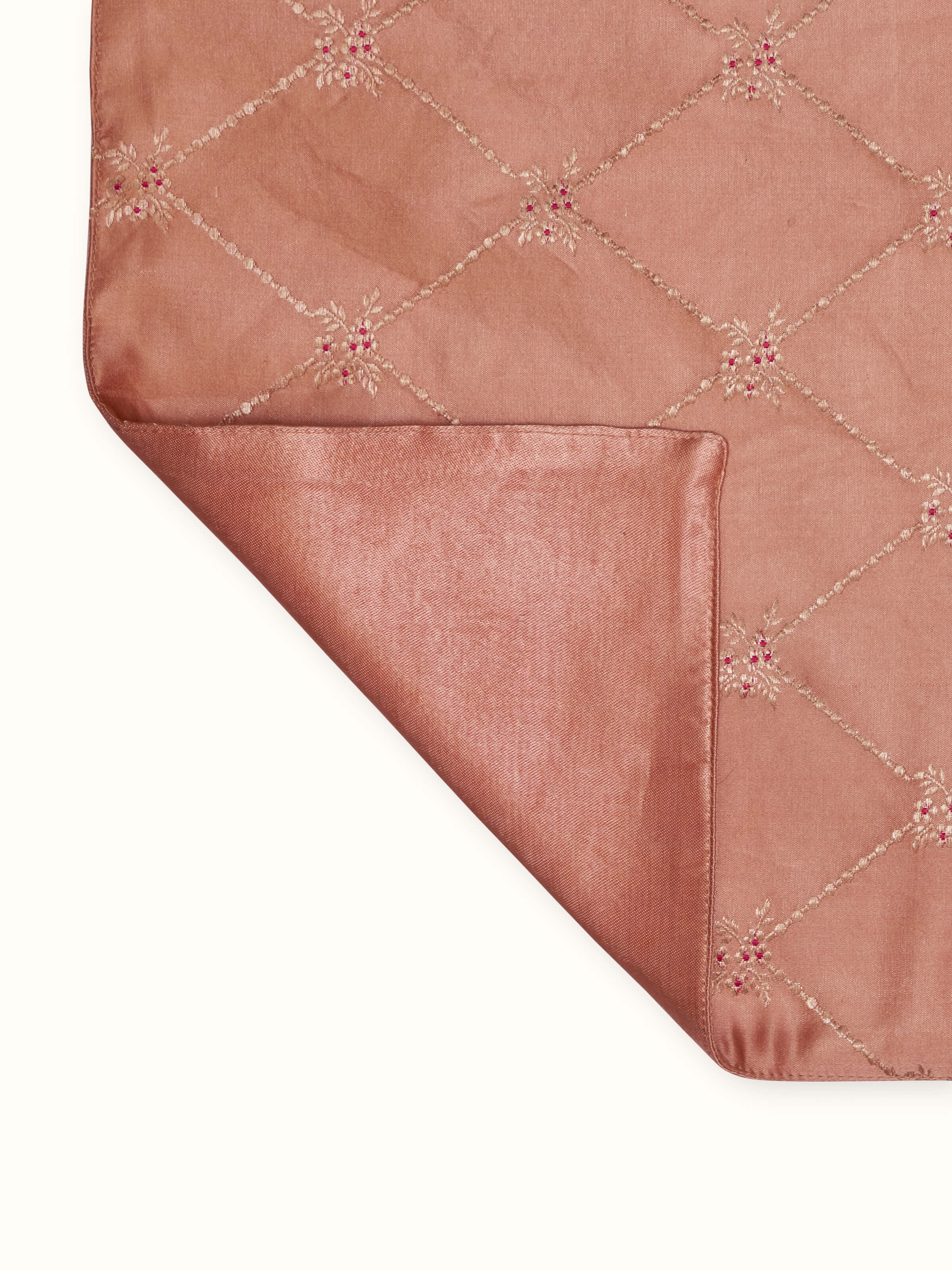Back view showing texture and finish of handloom Banarasi brocade table mat in peach.