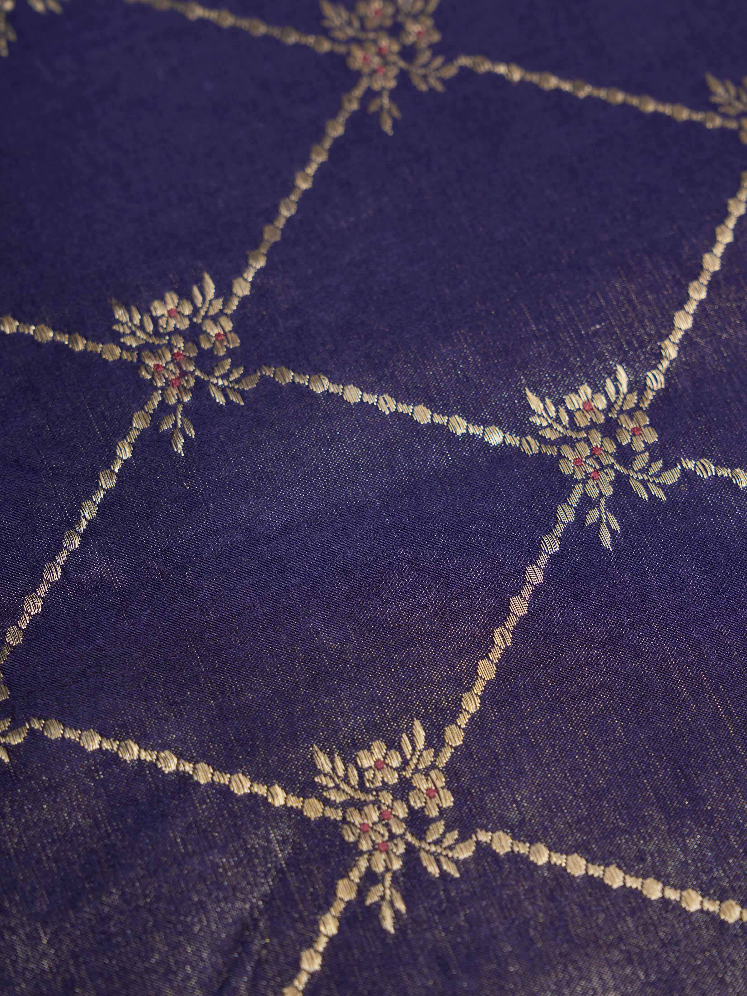 Detail shot of brocade weave on navy silk Banarasi table mat