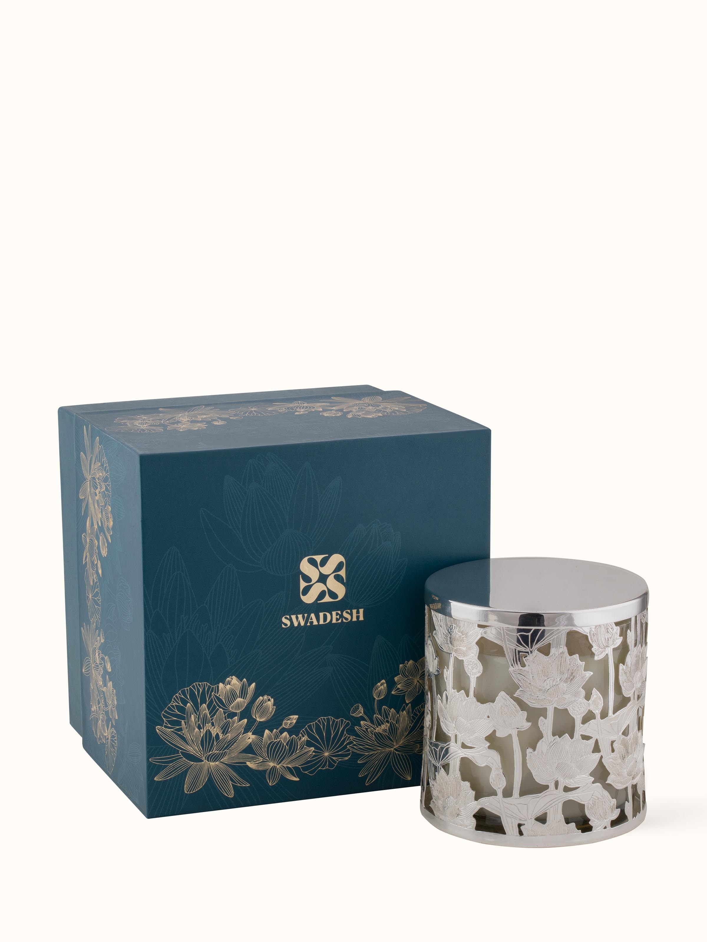 Detailed view of silver-plated brass candle holder's base, emphasizing high-quality finish and decorative elements.