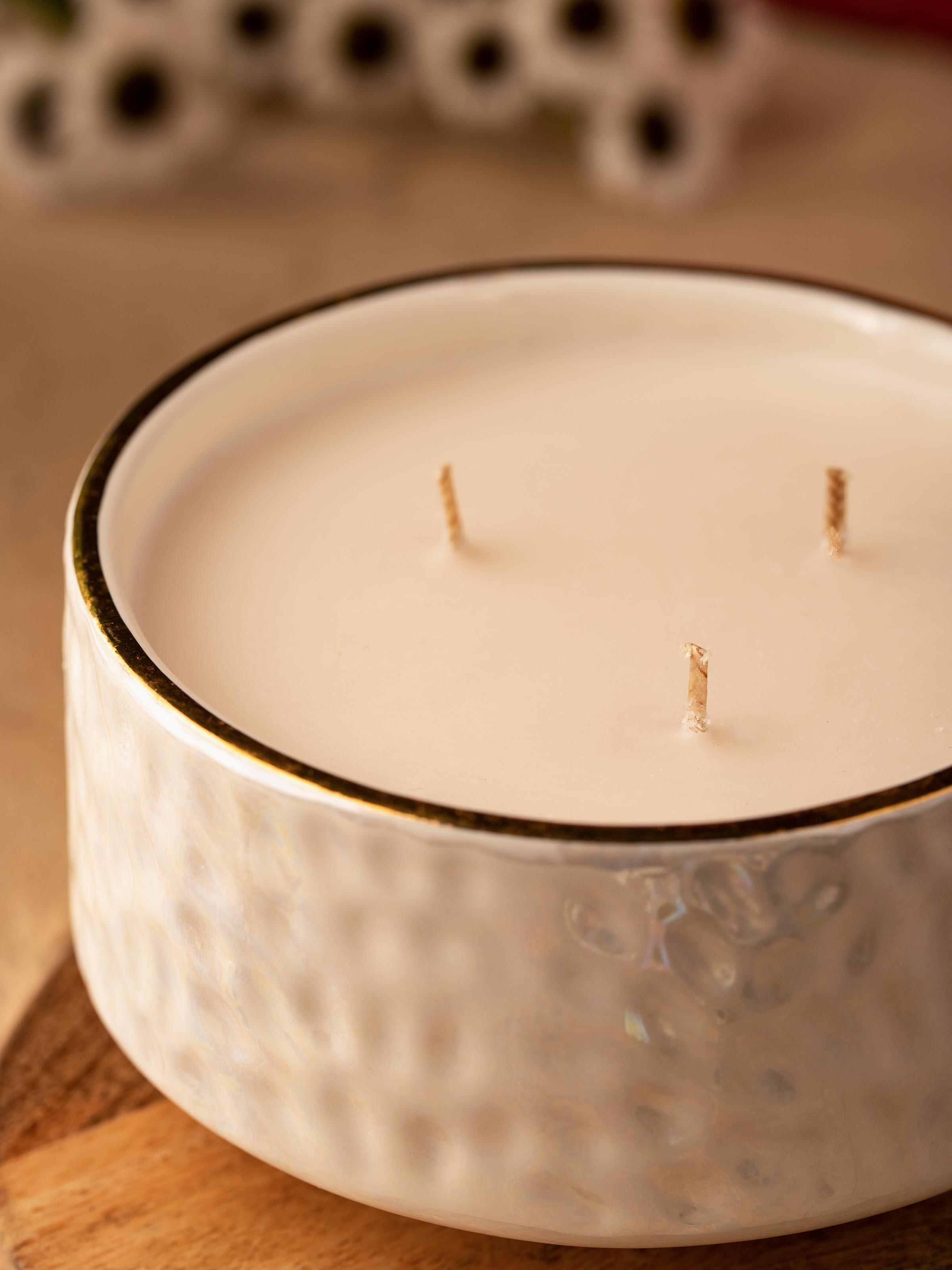Top view of White Ceramic Candle showing the candle wick and the open ceramic container.