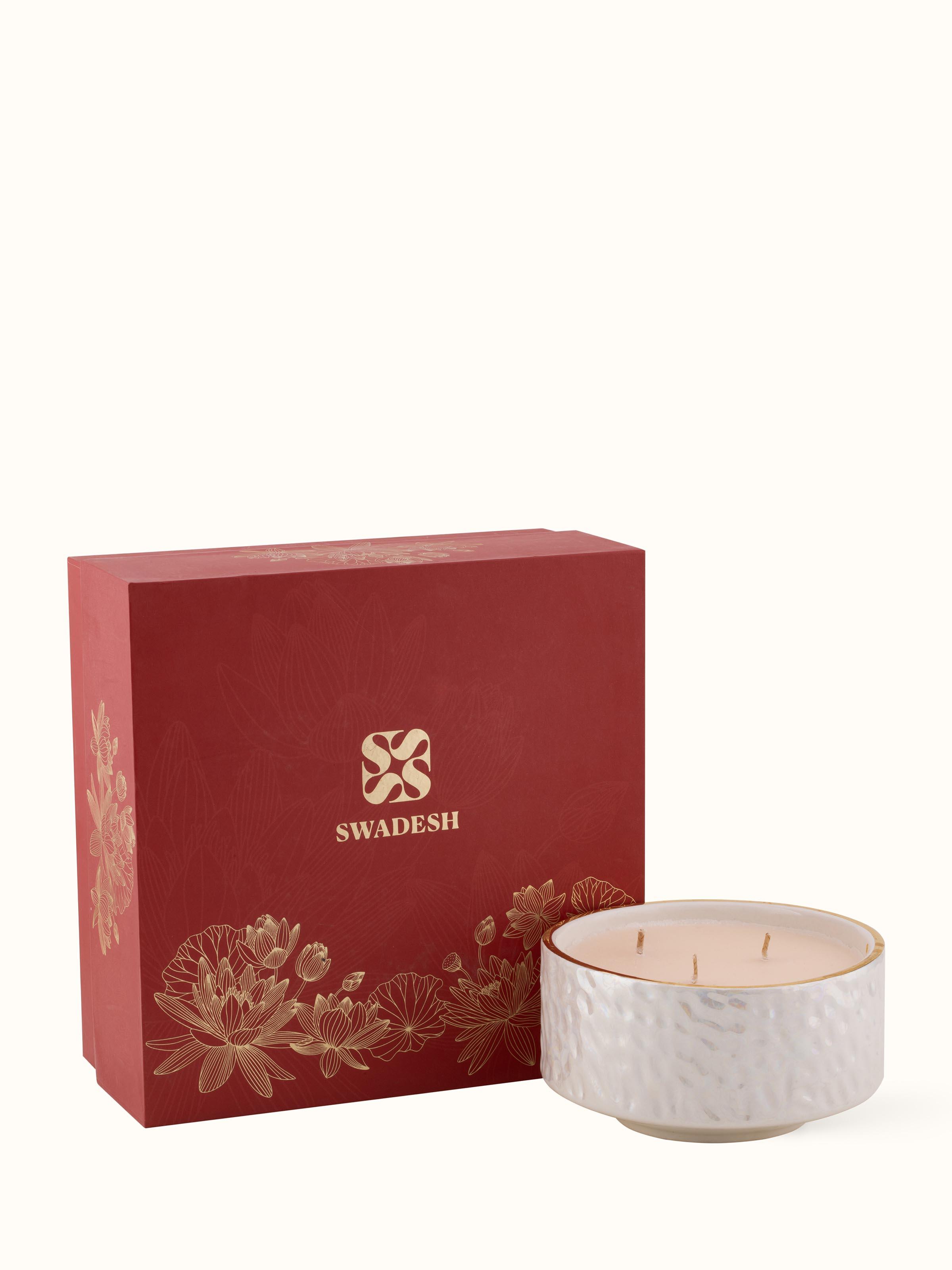 Close-up view of White Ceramic Candle focusing on the texture and finish of the ceramic material.