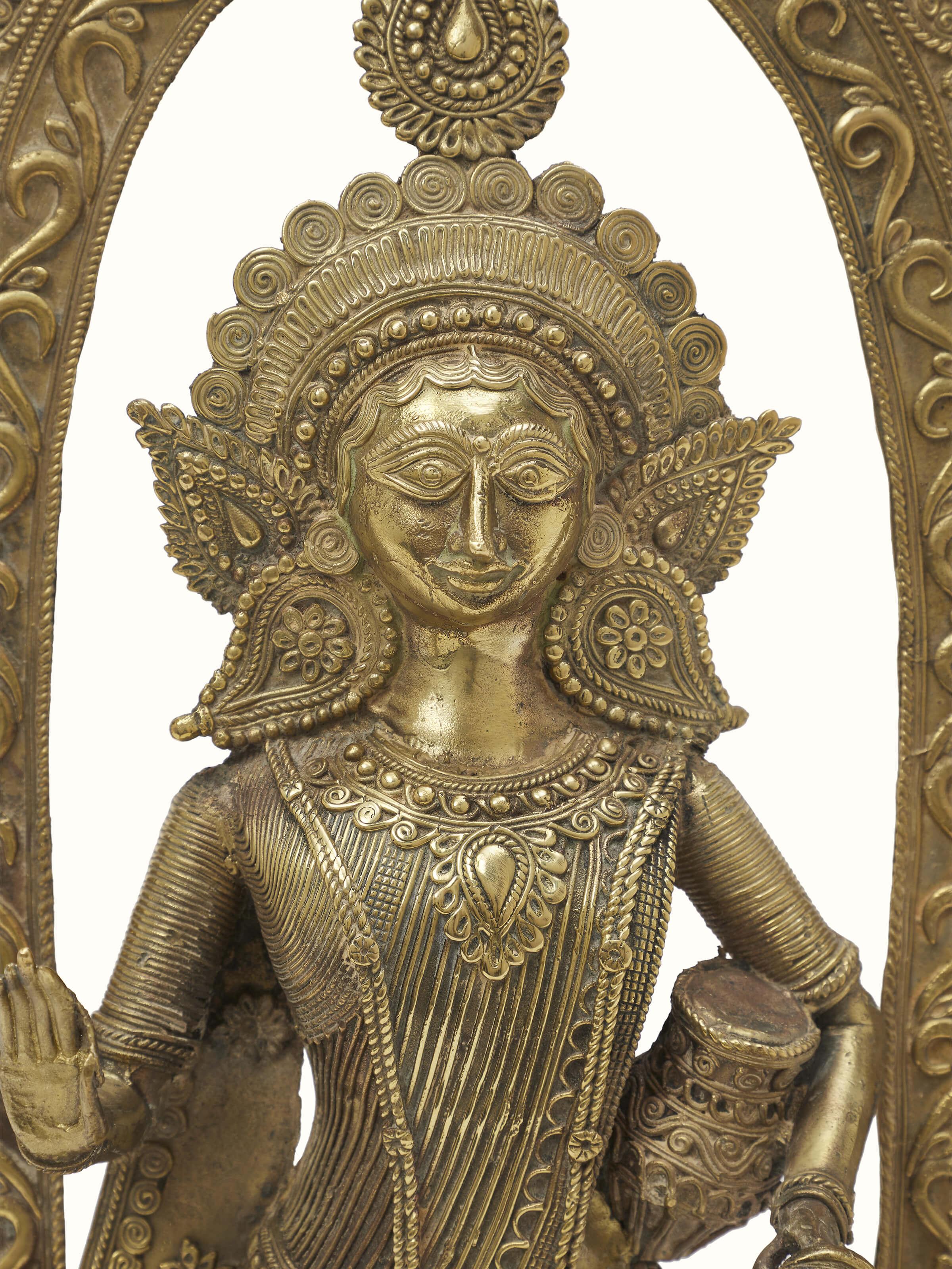 Artistic view of Vasudha dhokra brass Lakshmi idol, highlighting the overall craftsmanship.