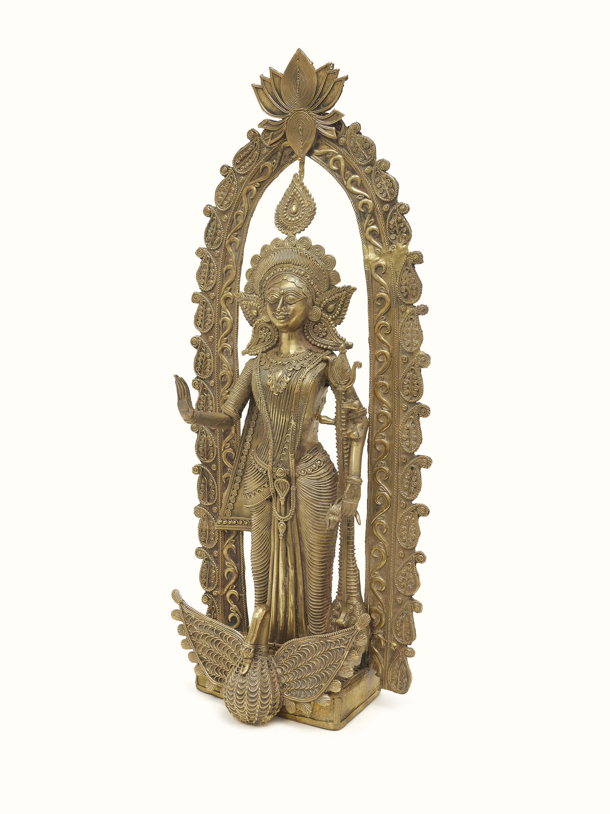 Side view of Dhokra Saraswati Brass Idol displaying detailed craftsmanship and design