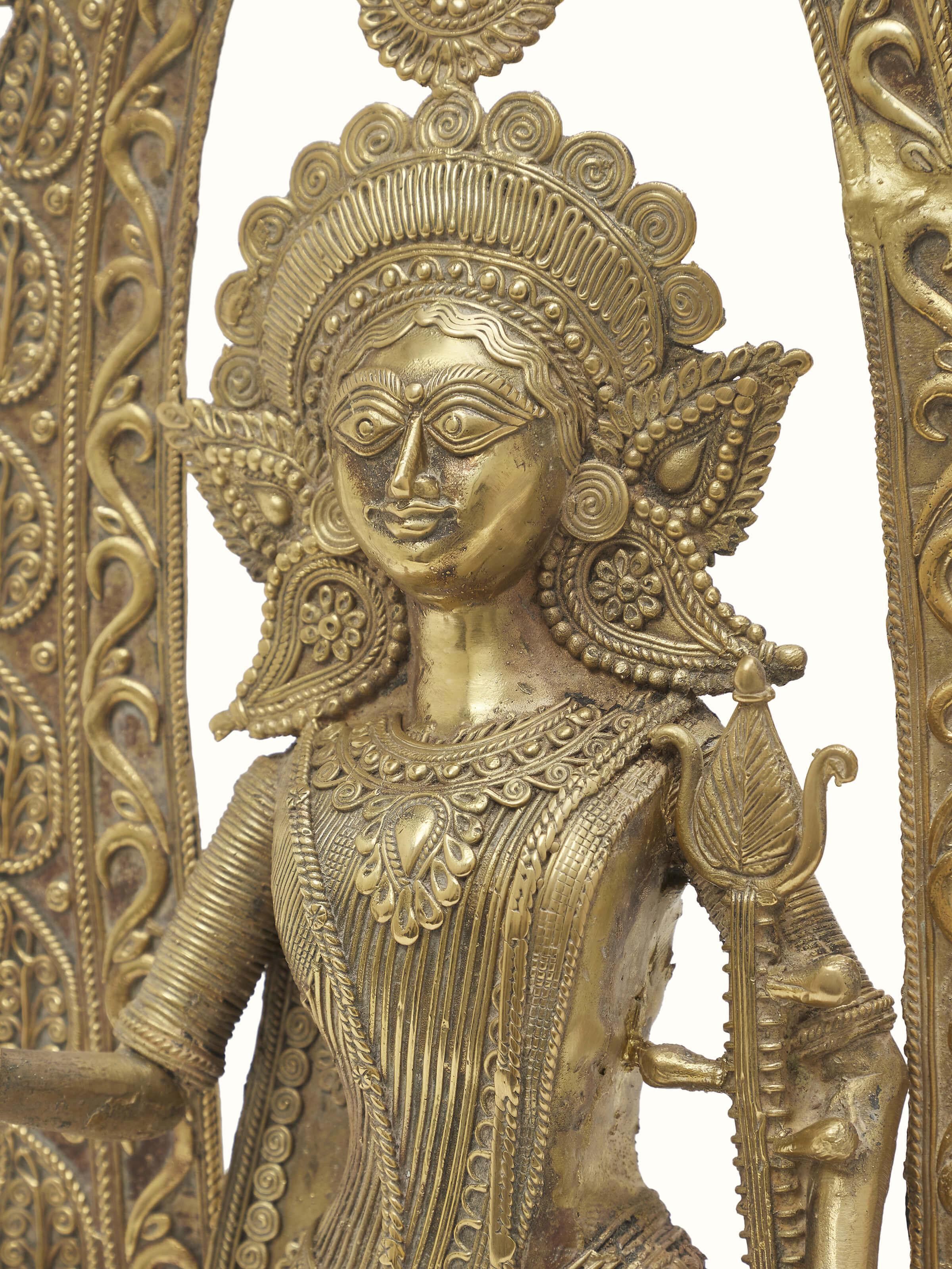 Close-up of Dhokra Saraswati Brass Idol highlighting fine metalwork and traditional artistry