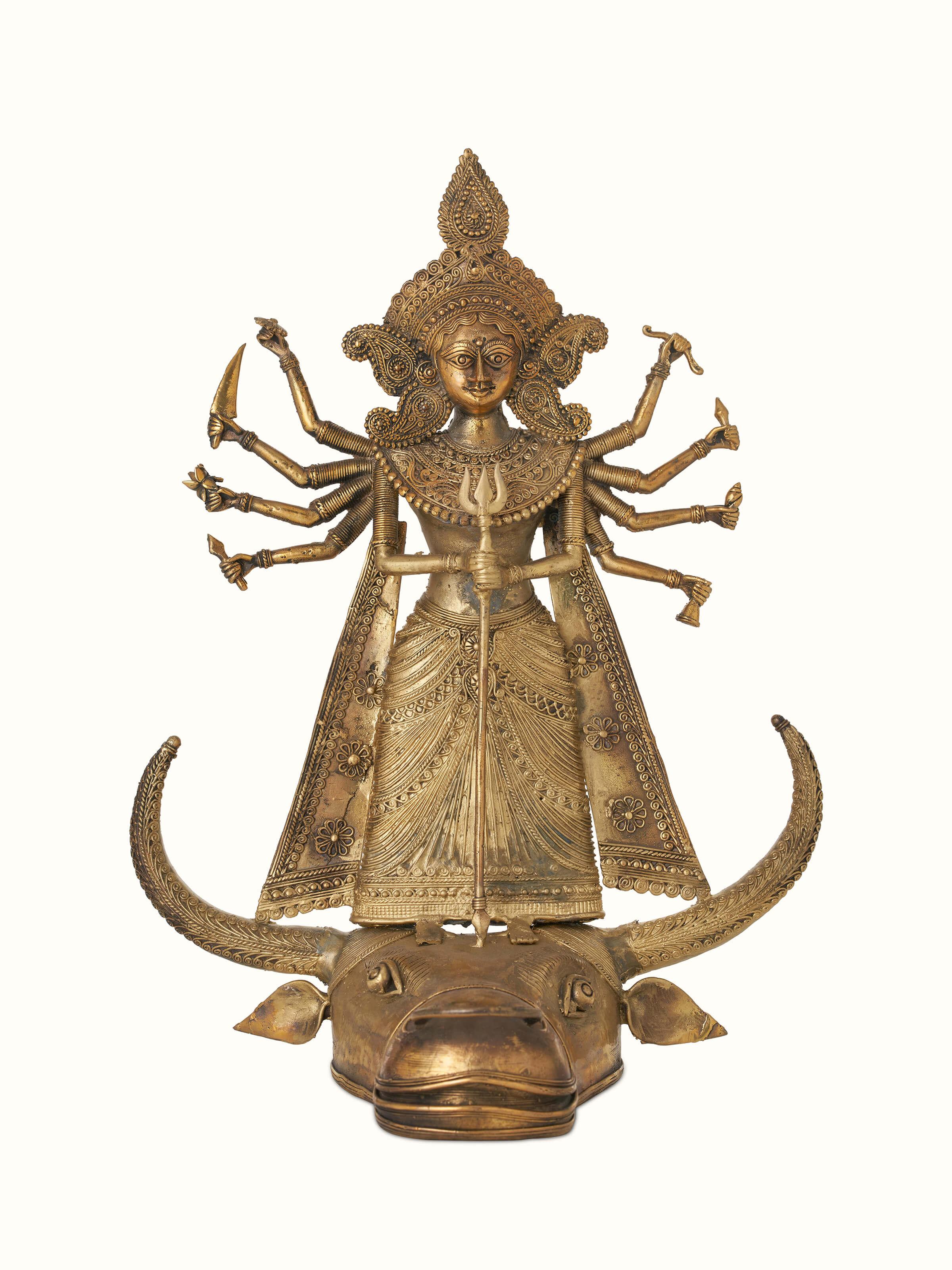 Front view of Brass dhokra Durga on bull idol in golden color displaying detailed craftsmanship and design.