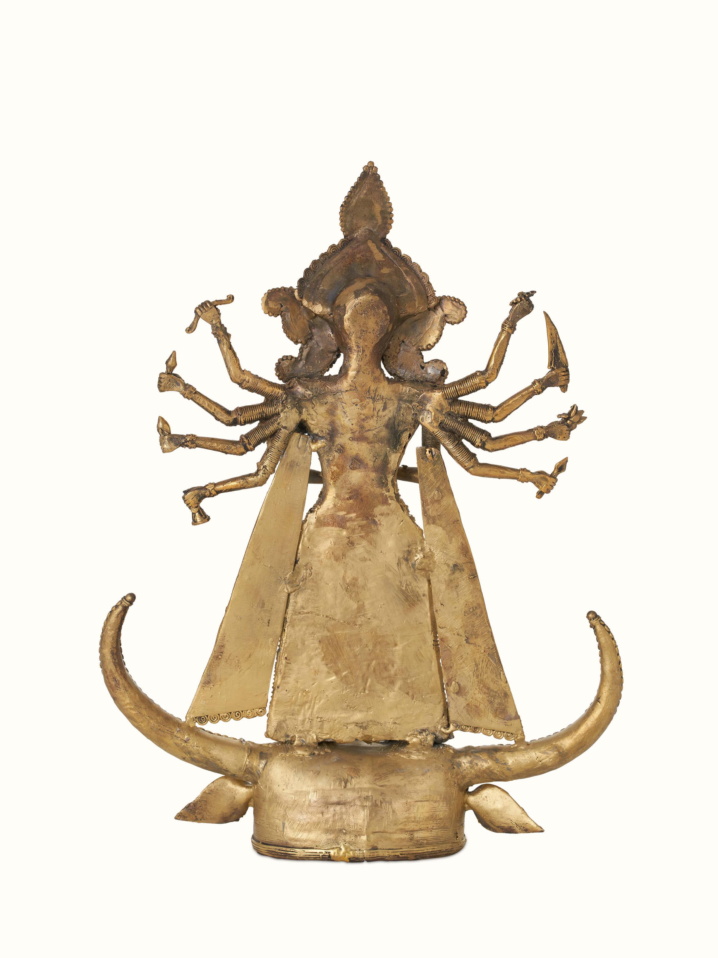 Full view of Brass dhokra Durga on bull idol in golden color showing complete design and artistry.