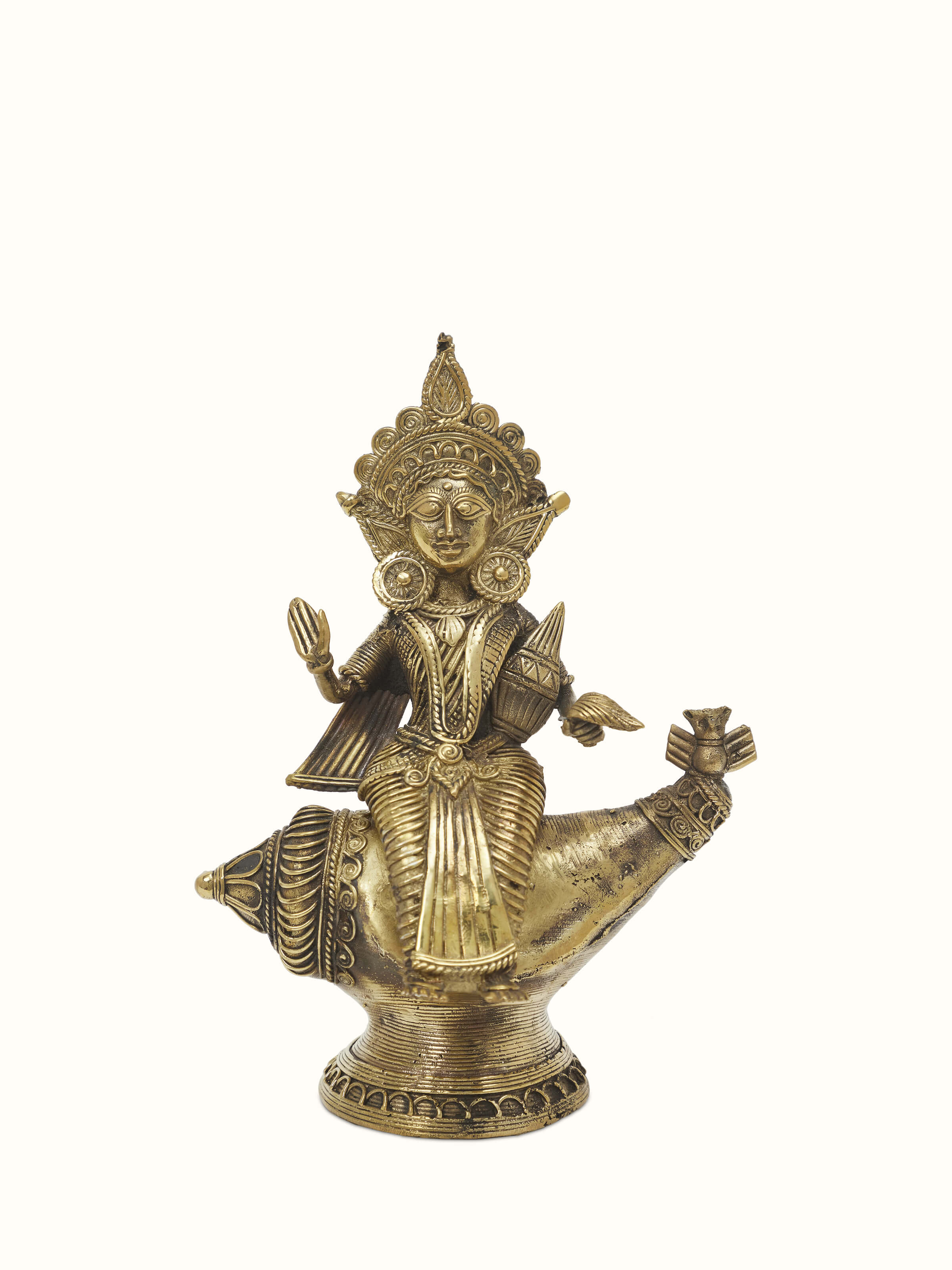 Front view of Vishnupatni dhokra brass Lakshmi on conch shell idol with detailed craftsmanship