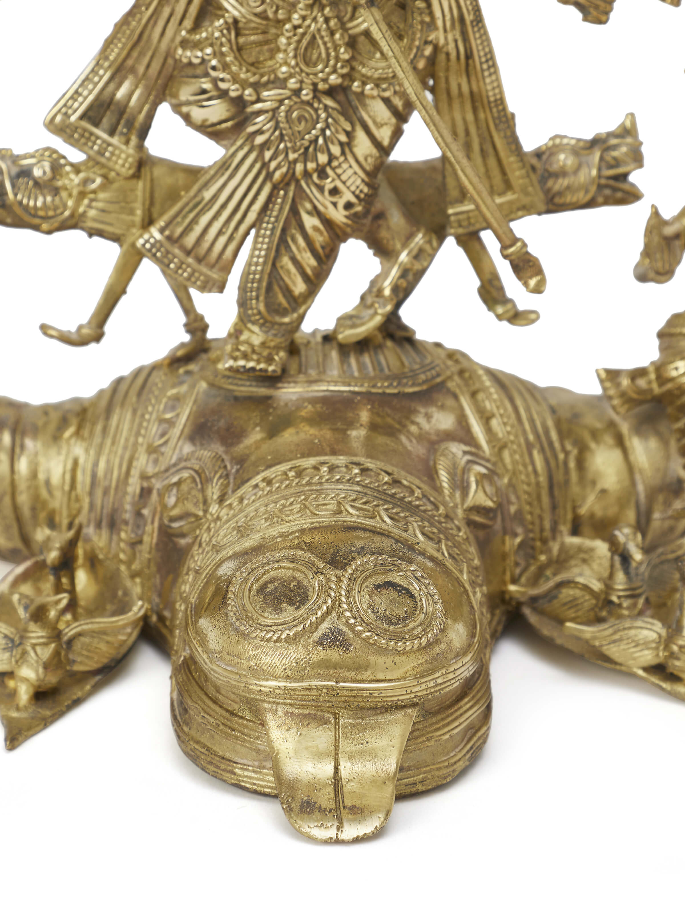 Close-up of Heavenly Dhokra brass Devi family idol featuring detailed decorative elements