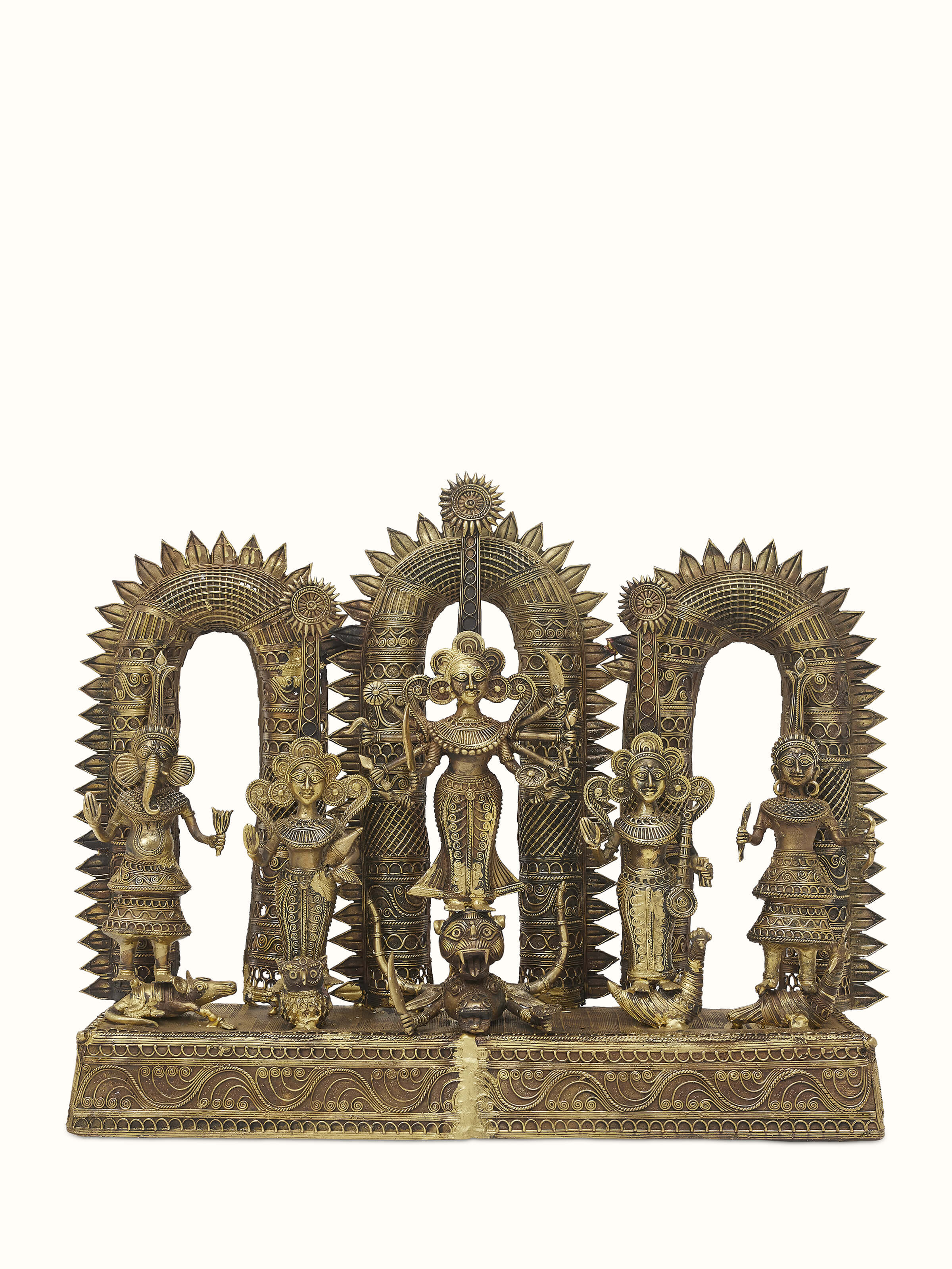 Front view of Pristine dhokra brass goddess idol showcasing detailed craftsmanship and traditional design