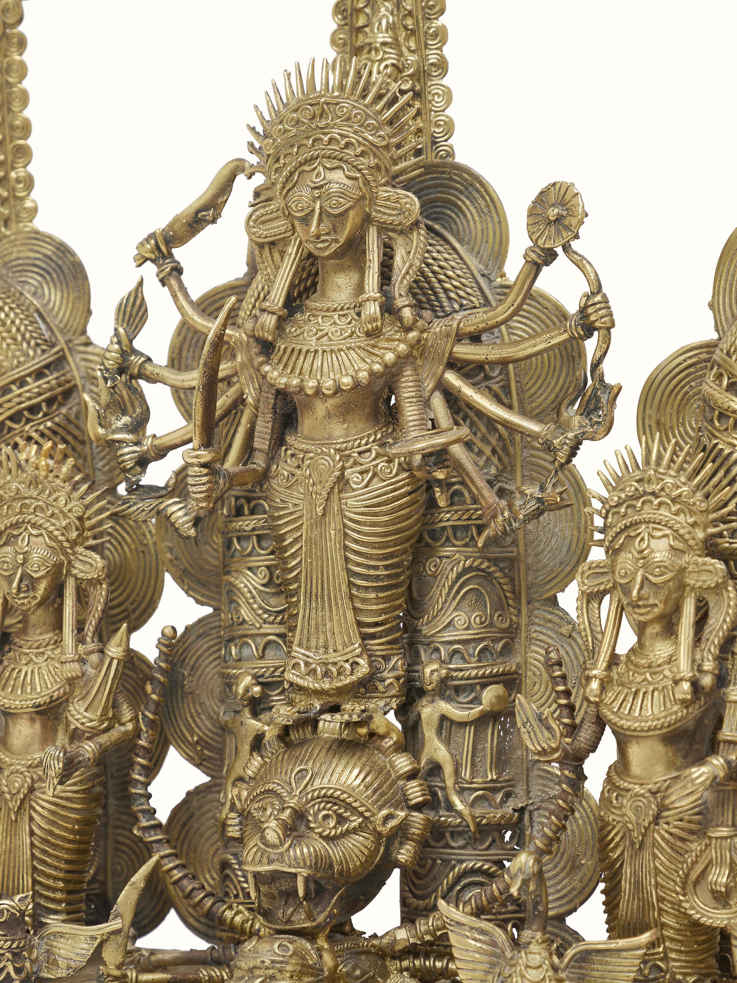 Detailed close-up of Beatific Dhokra Brass Creator Goddess Idol highlighting the intricate details and finishing