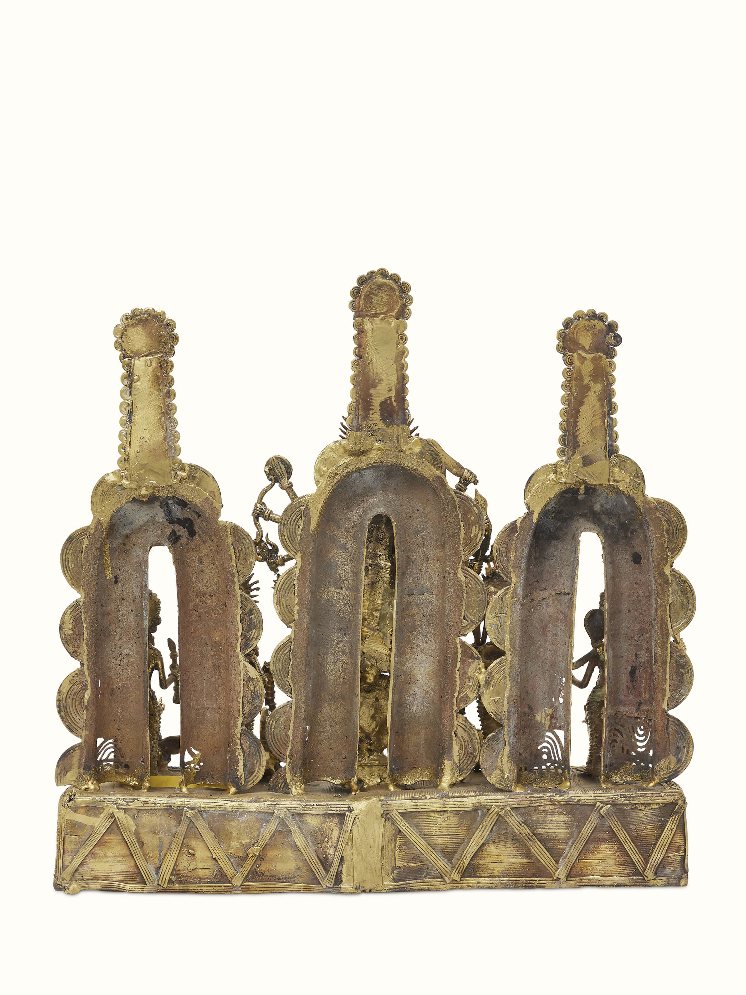 Angled view of Beatific Dhokra Brass Creator Goddess Idol showcasing the fine craftsmanship and design