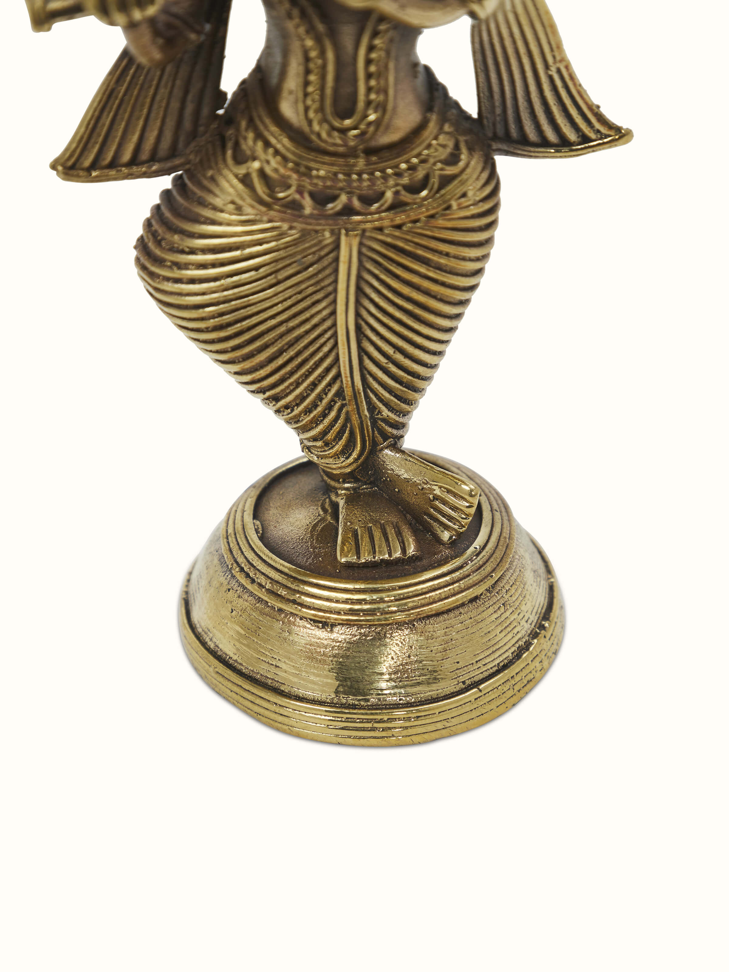 Close-up view of Brass dhokra Krishna idol showcasing the fine details and traditional dhokra craftsmanship