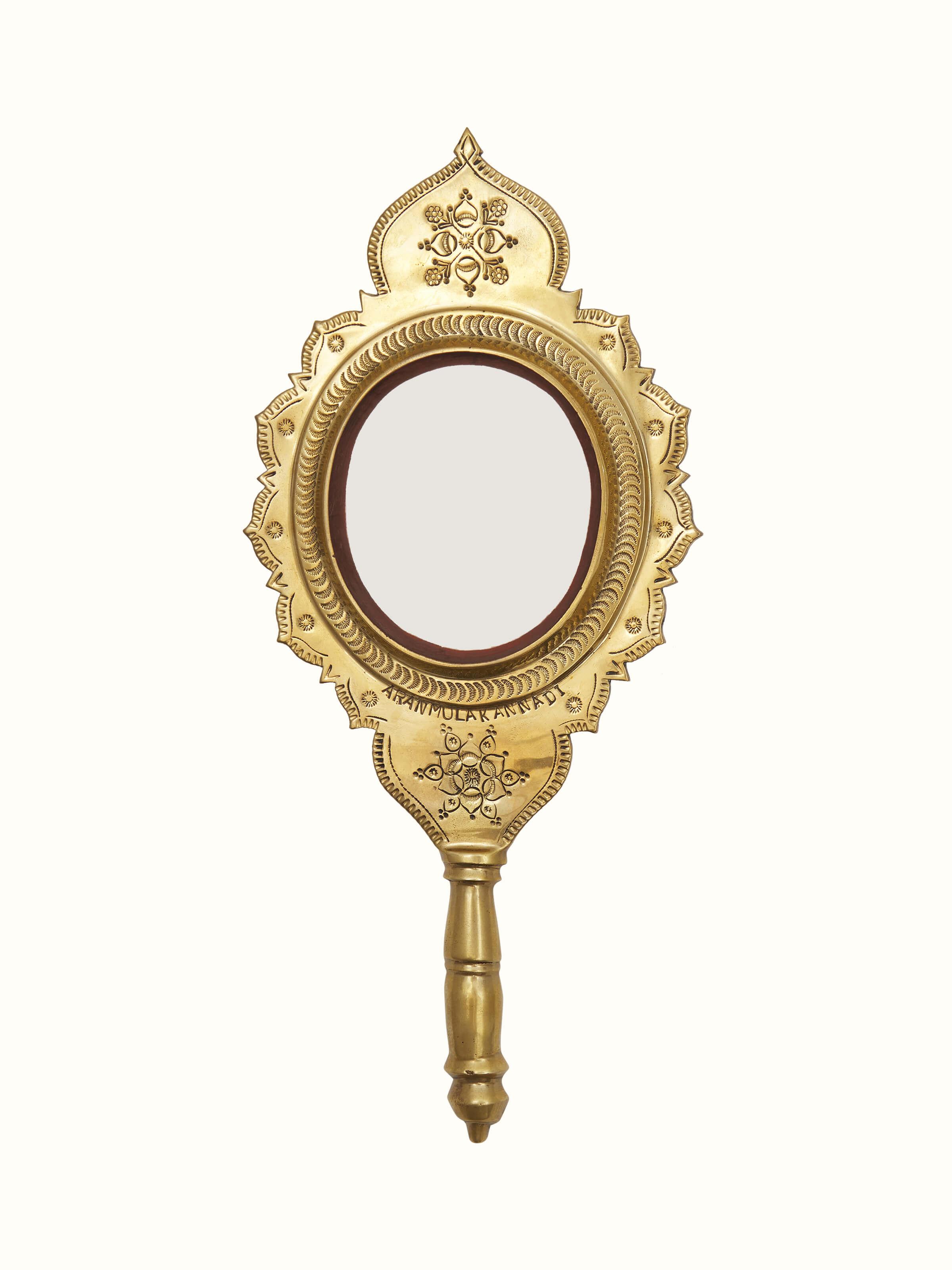 Front view of Transitional Aranmula Kannadi brass mirror showcasing its traditional craftsmanship and reflective surface