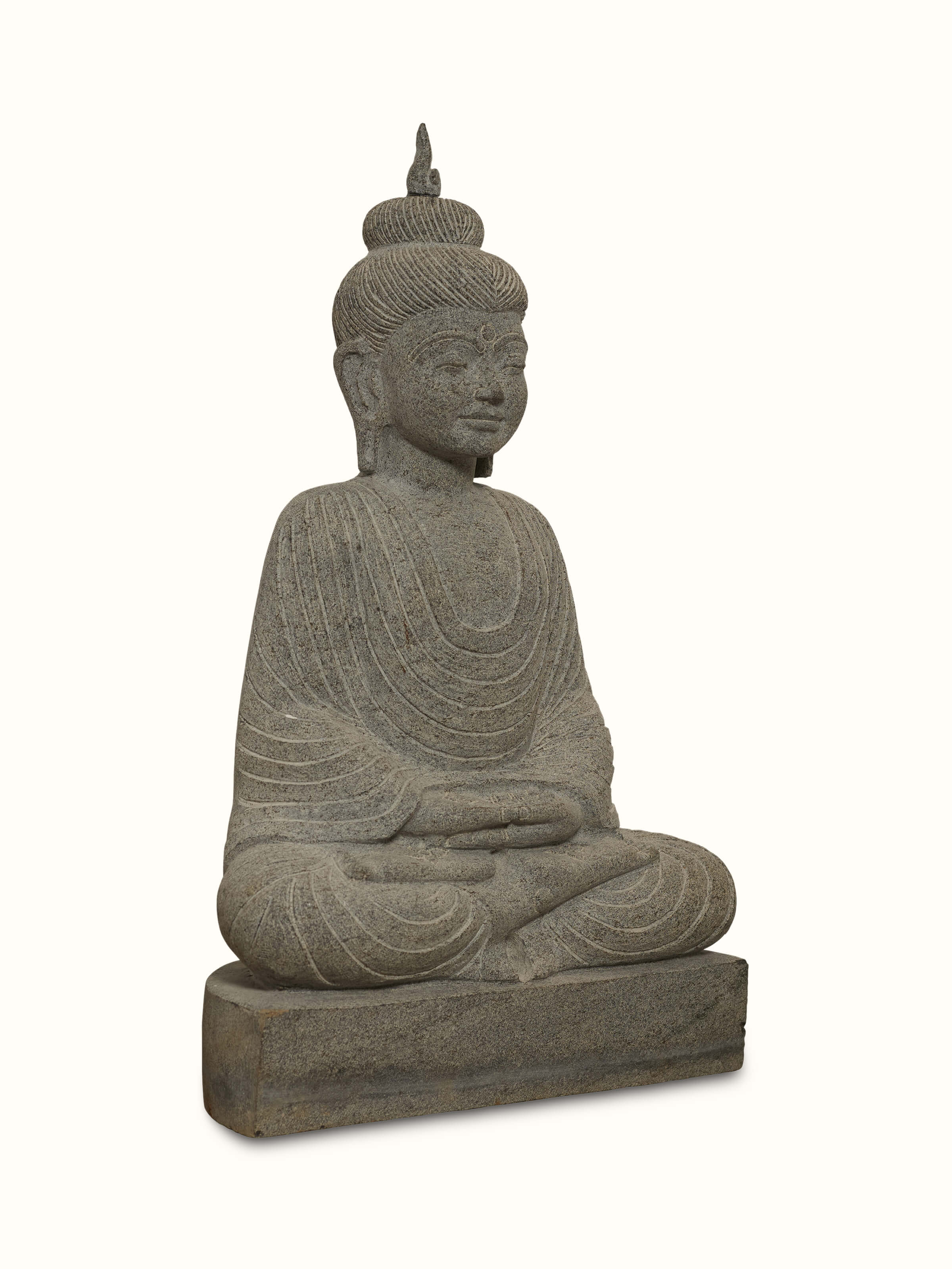 Side view of Serene Carved Stone Buddha Idol focusing on the profile and intricate carving details.
