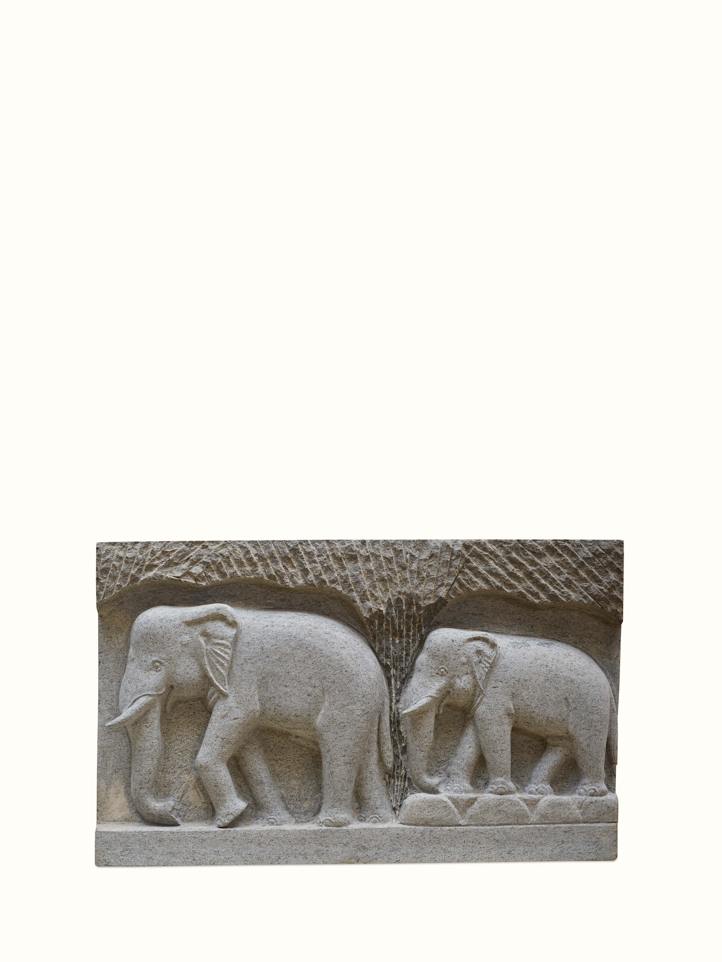 Front view of Magnificent carved stone elephant panel sculpture featuring detailed and majestic elephant carvings