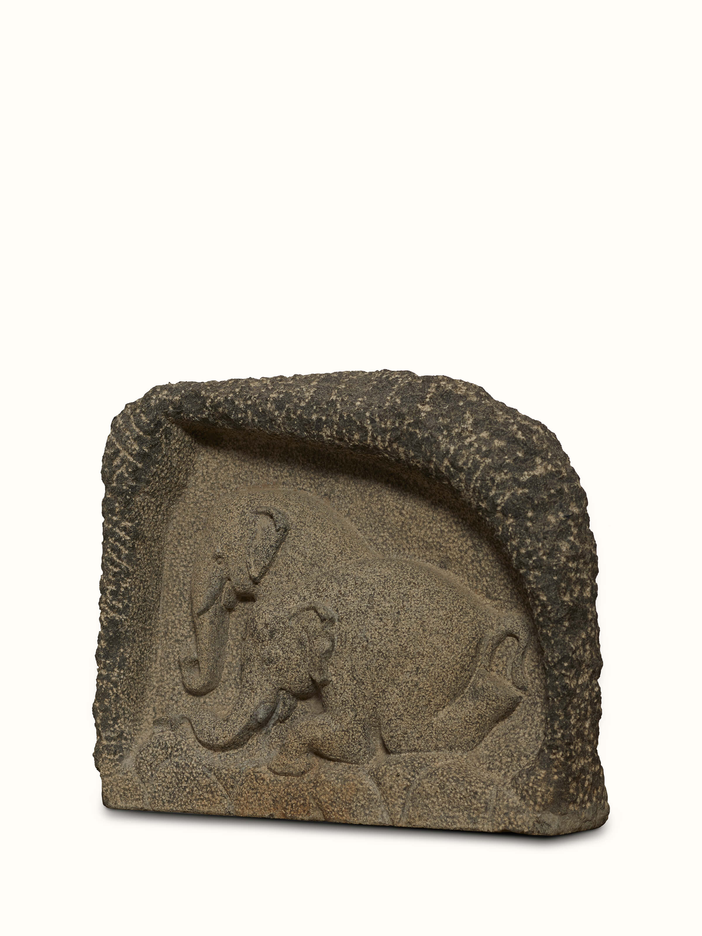 Close-up of Adambara carved stone shore elephants sculpture highlighting the textures and fine details.