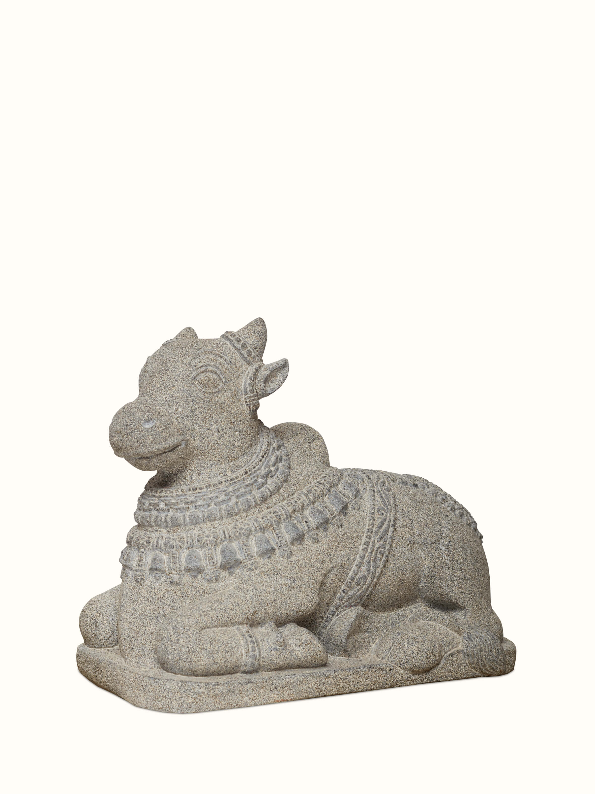 Side view of Majestique carved stone adi nandi sculpture emphasizing the craftsmanship and artistic detail
