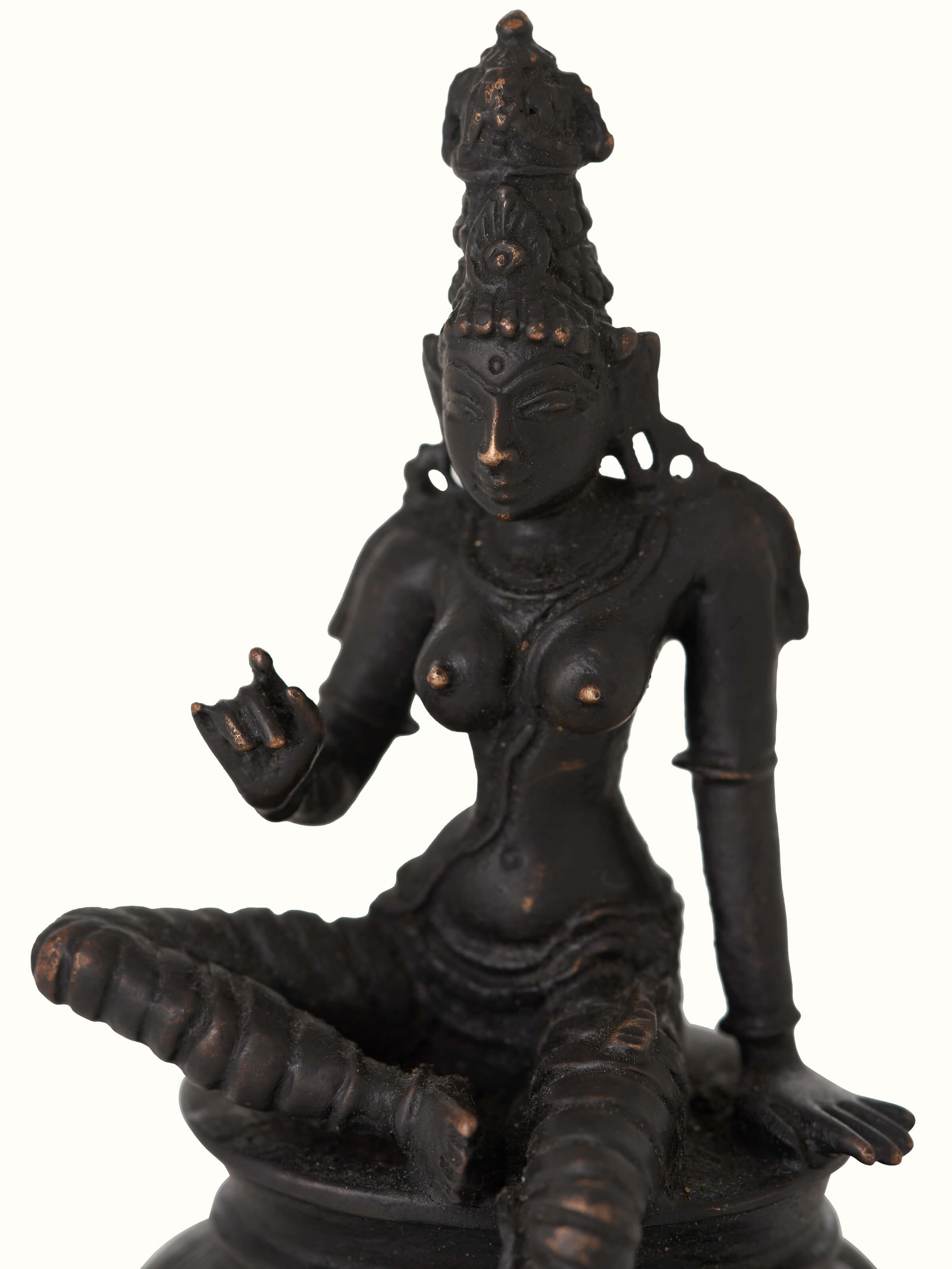 Close-up of pristine bronze casting Boga Sakthi idol with detailed artistry