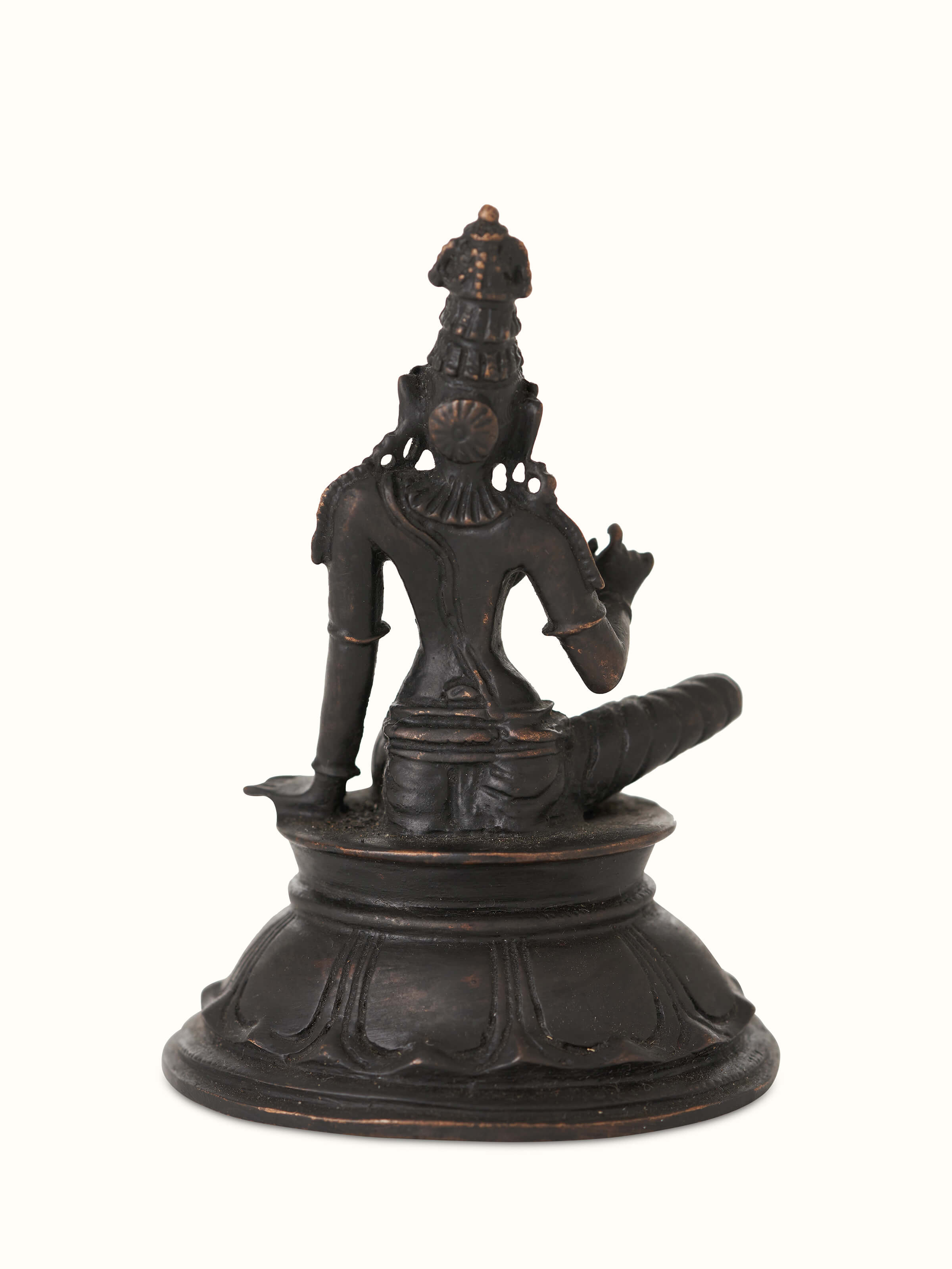 Side view of pristine bronze casting Boga Sakthi idol highlighting intricate details