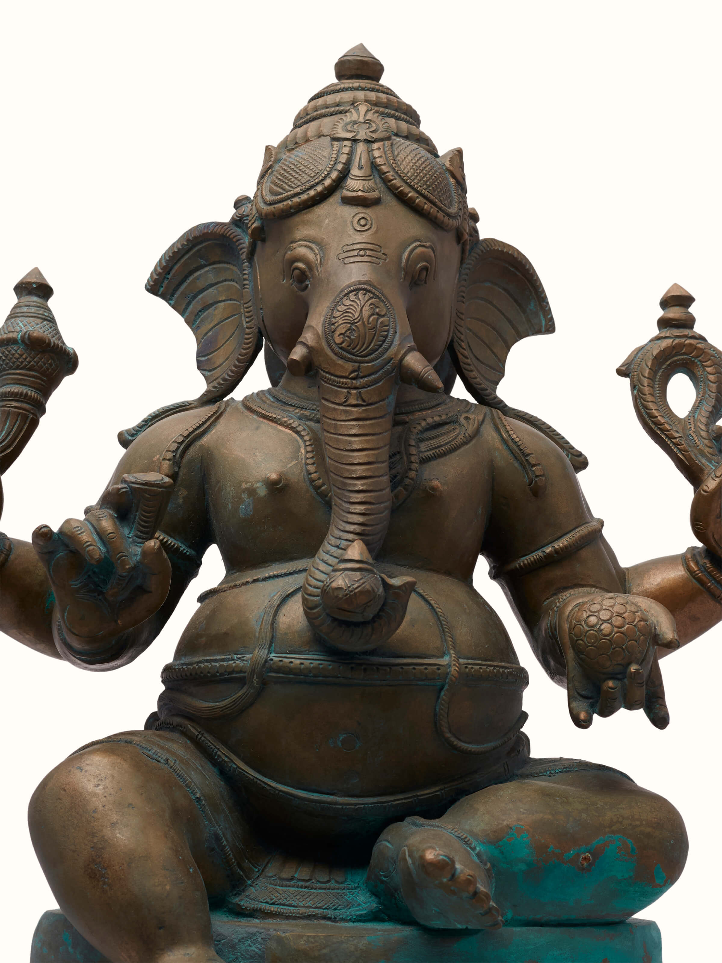 Detailed side view of the Prathameshwara bronze casting Gajanana idol, showcasing the craftsmanship and bronze texture.