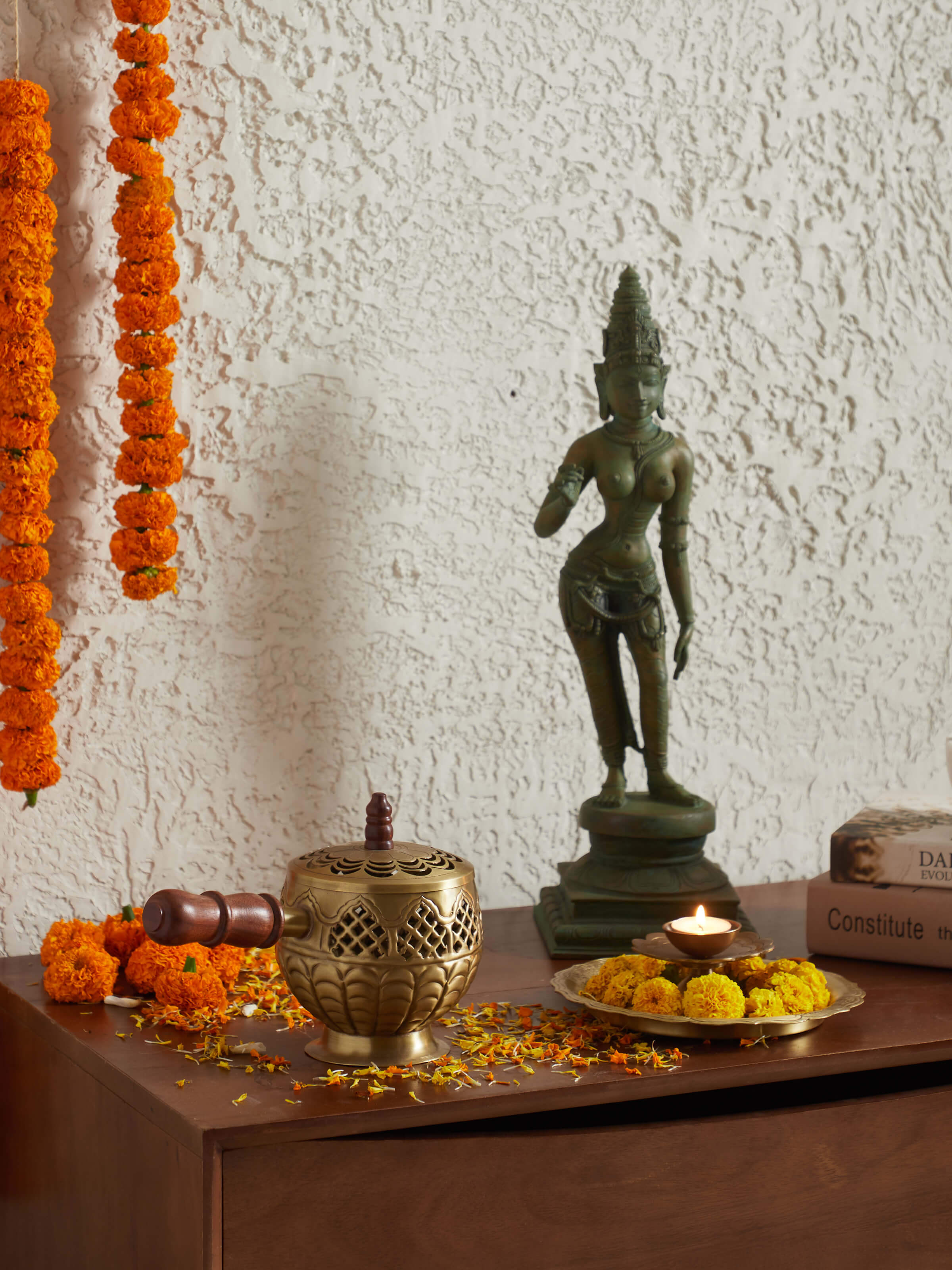 Side view of Gracious bronze casting goddess Parvathi idol showcasing detailed bronze artistry and elegant finish.