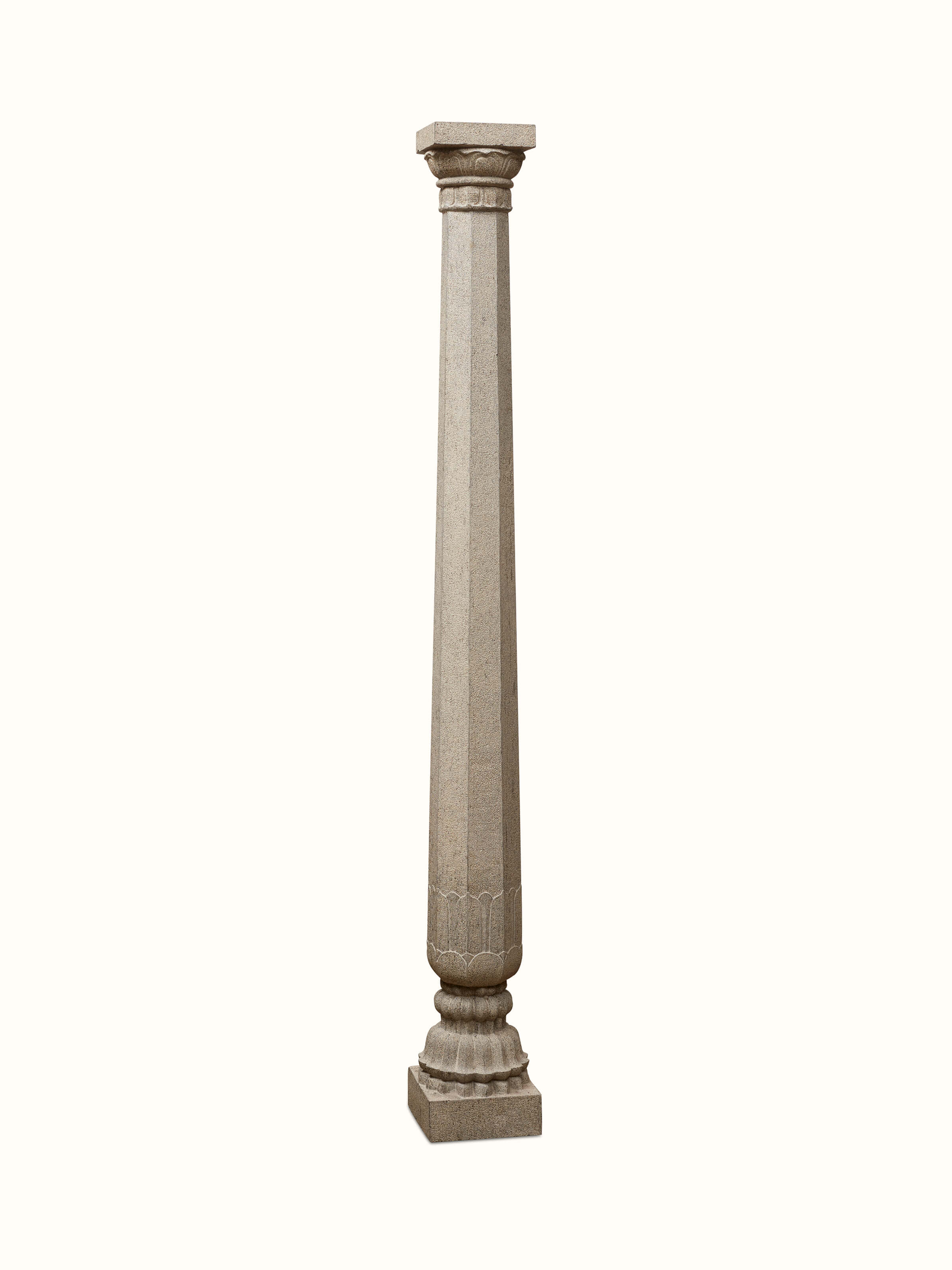 Front view of Prabal carved stone pillar sculpture showcasing its intricate carvings and elegant design