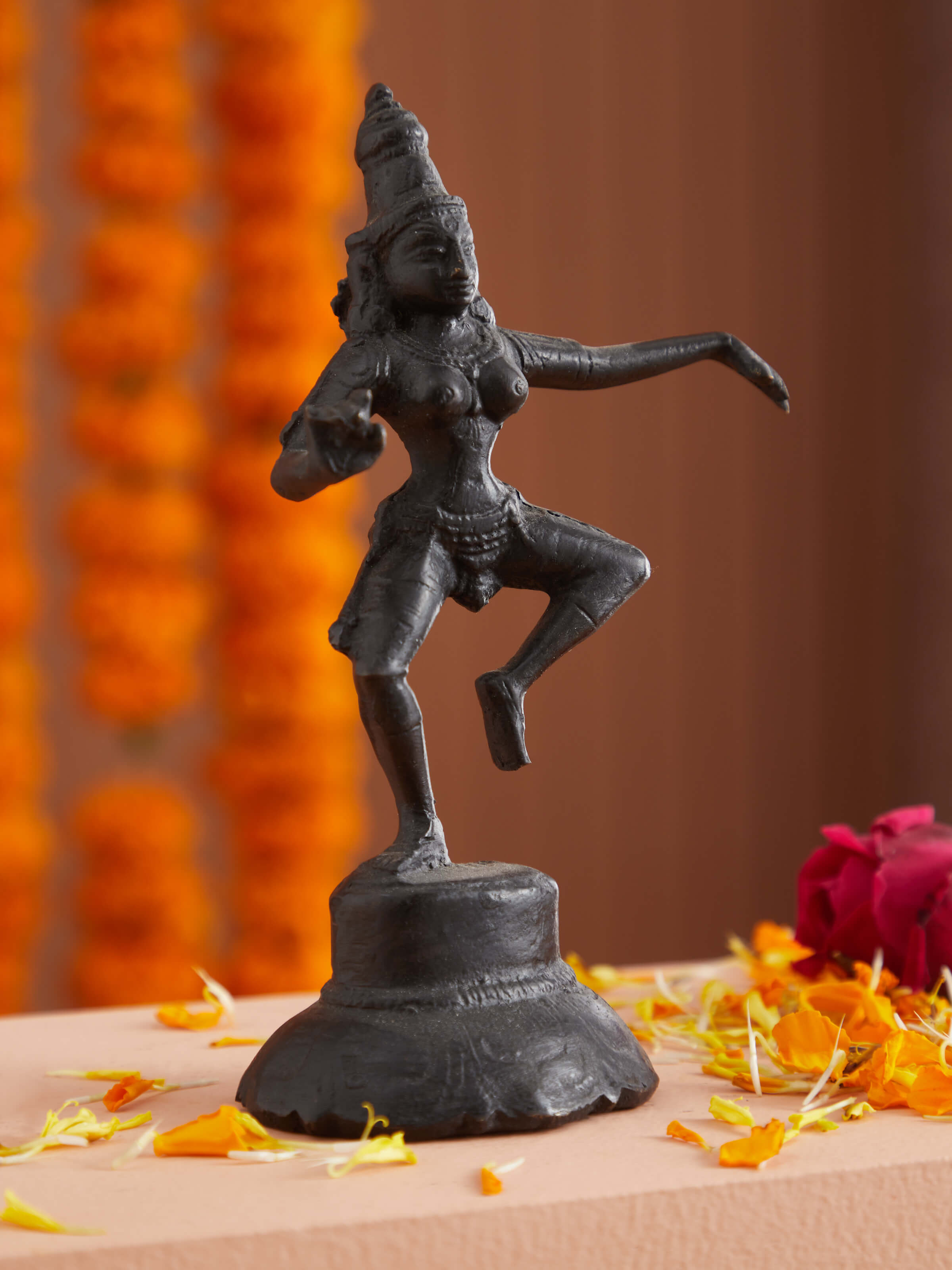 Side view of Graceful Bronze Casting Dancing Parvathi Idol showcasing artistic pose
