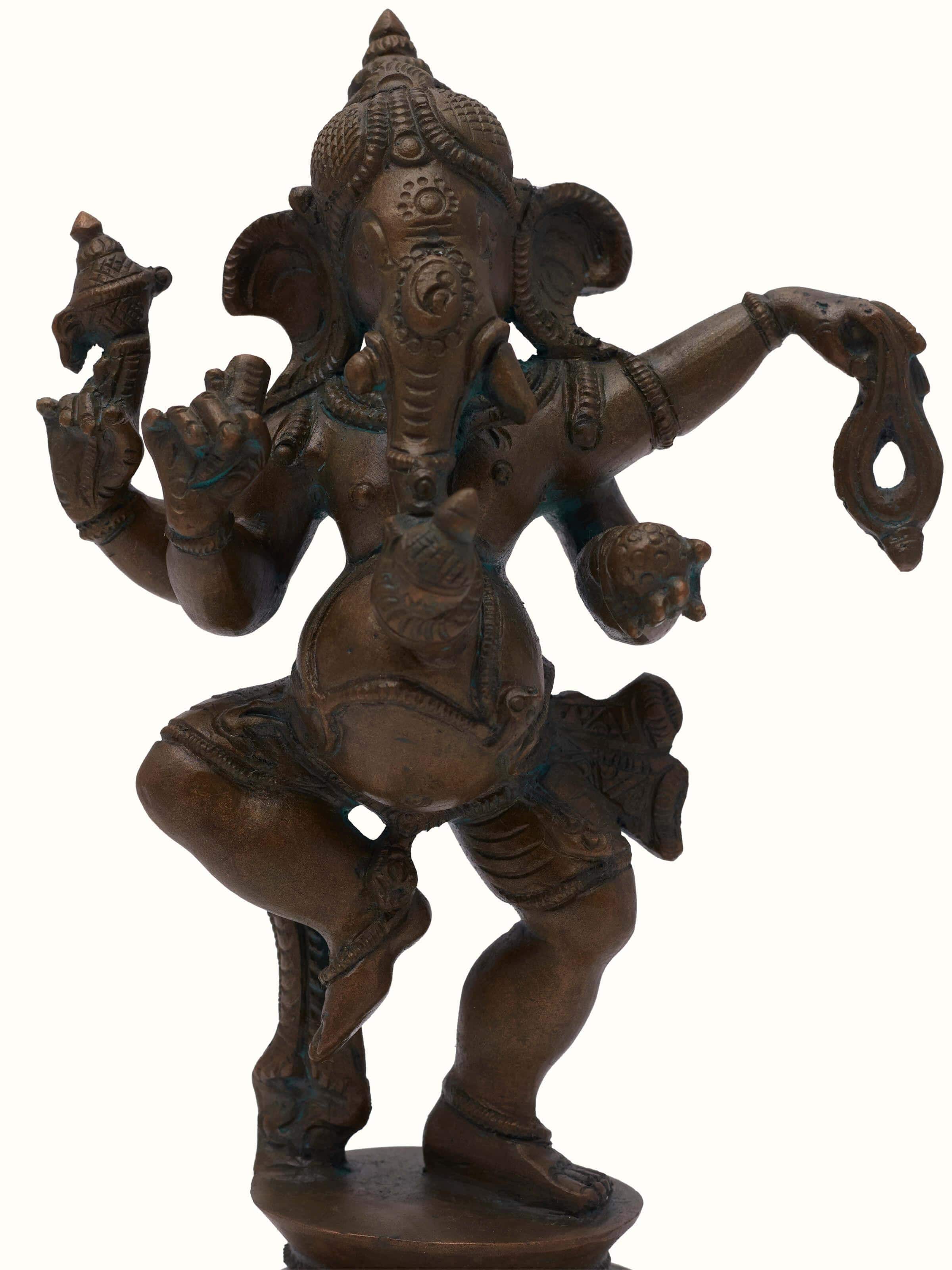 Angle view of bronze casting dancing Ganesha idol showcasing its elegant bronze finish and detailed work