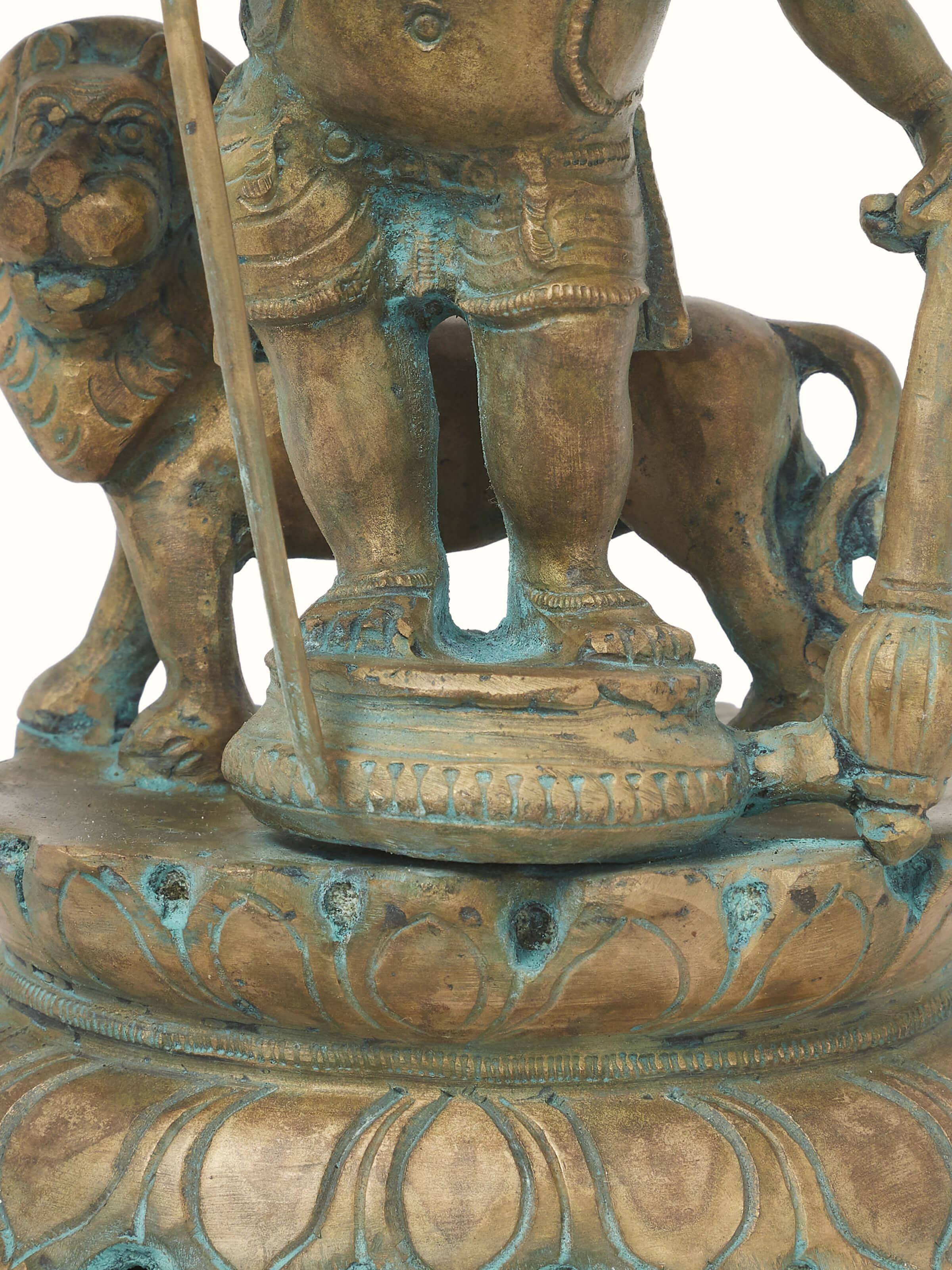 Angled view of Heramba bronze casting Trishul Ganesh idol emphasizing the arc and design