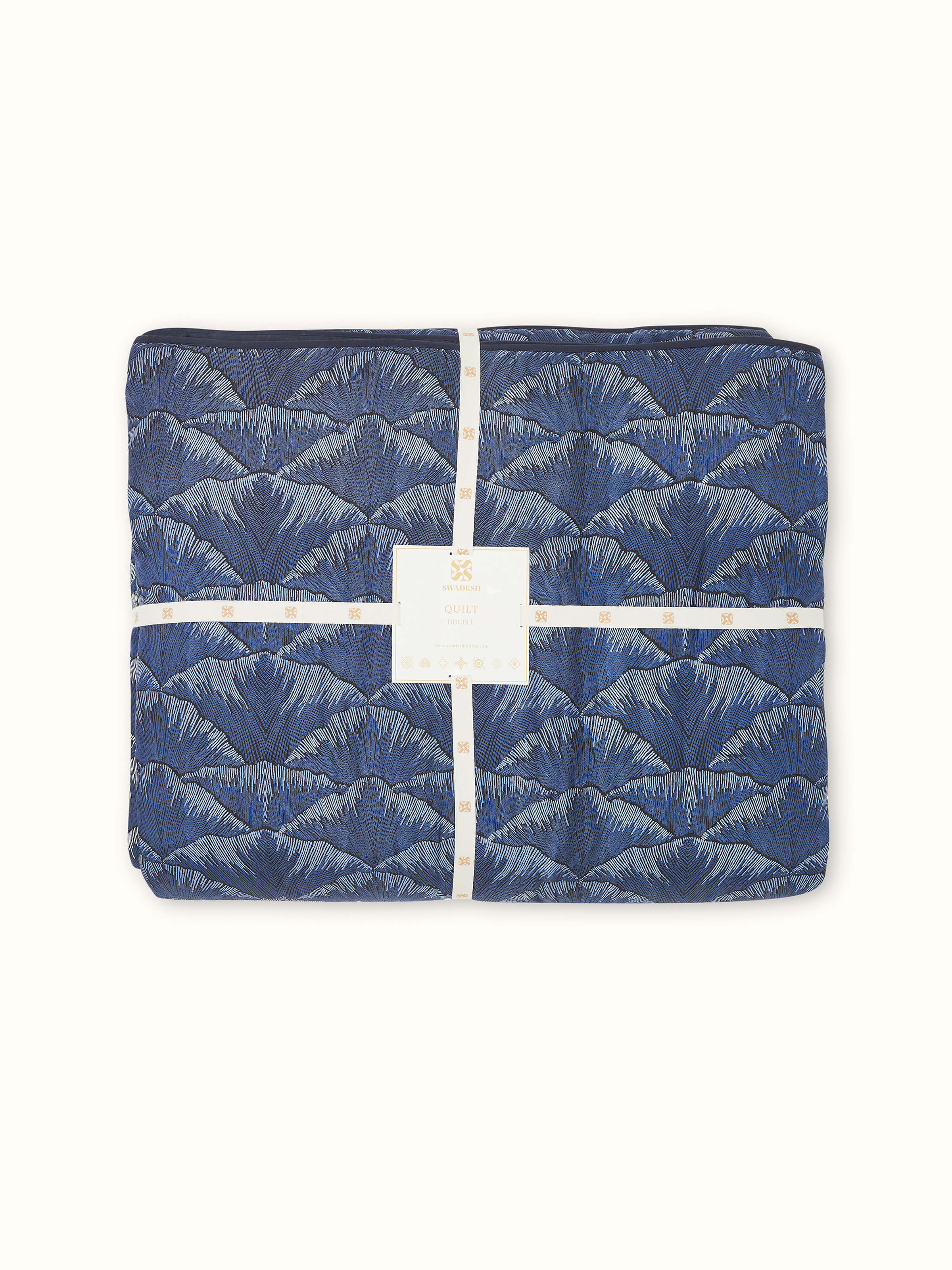 Close-up view of the Sanganeri block print details on the Parvat quilt